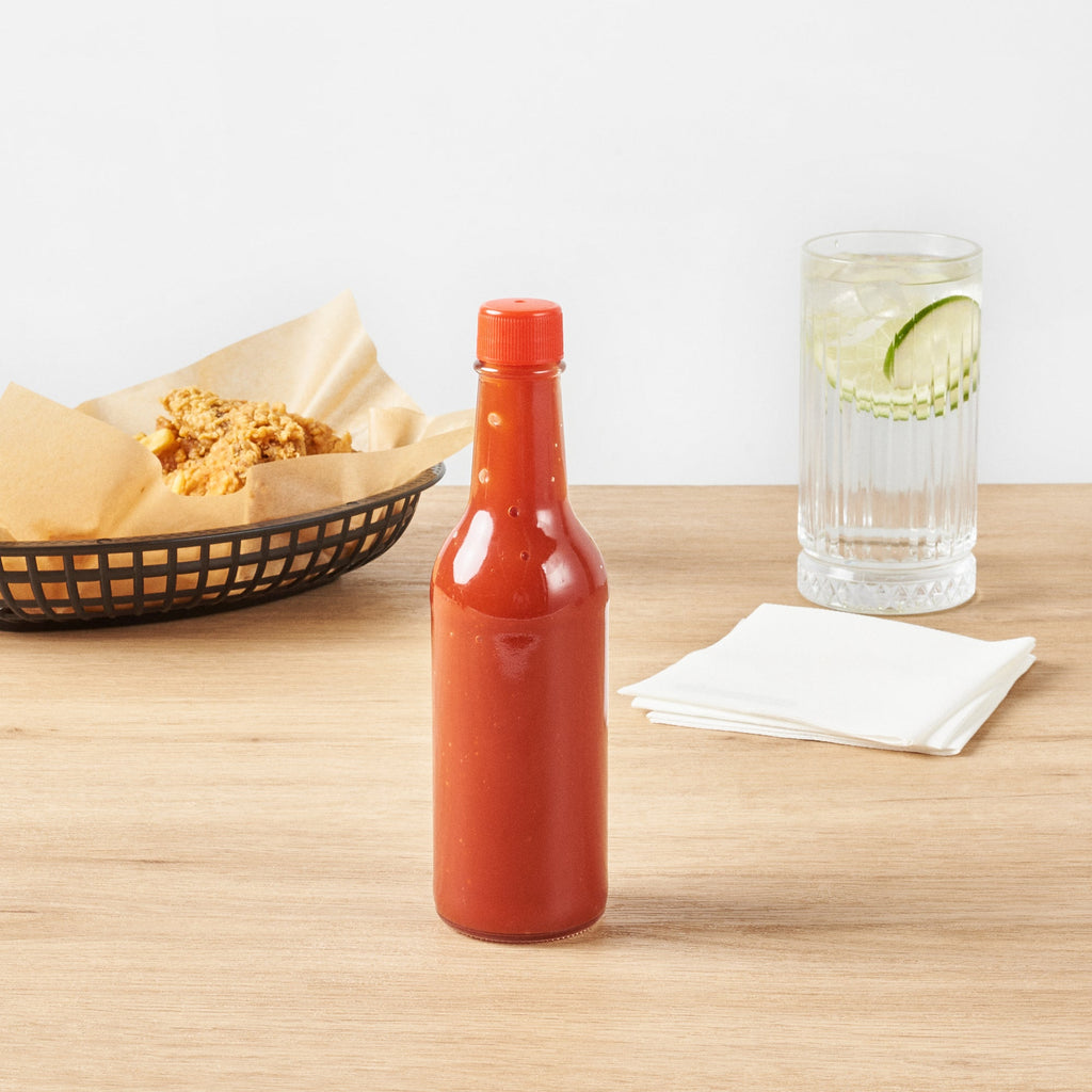 Vetri 9 oz Glass Woozy Bottle - with Red Cap - 2 1/4" x 2 1/4" x 7 3/4" - 10 count box