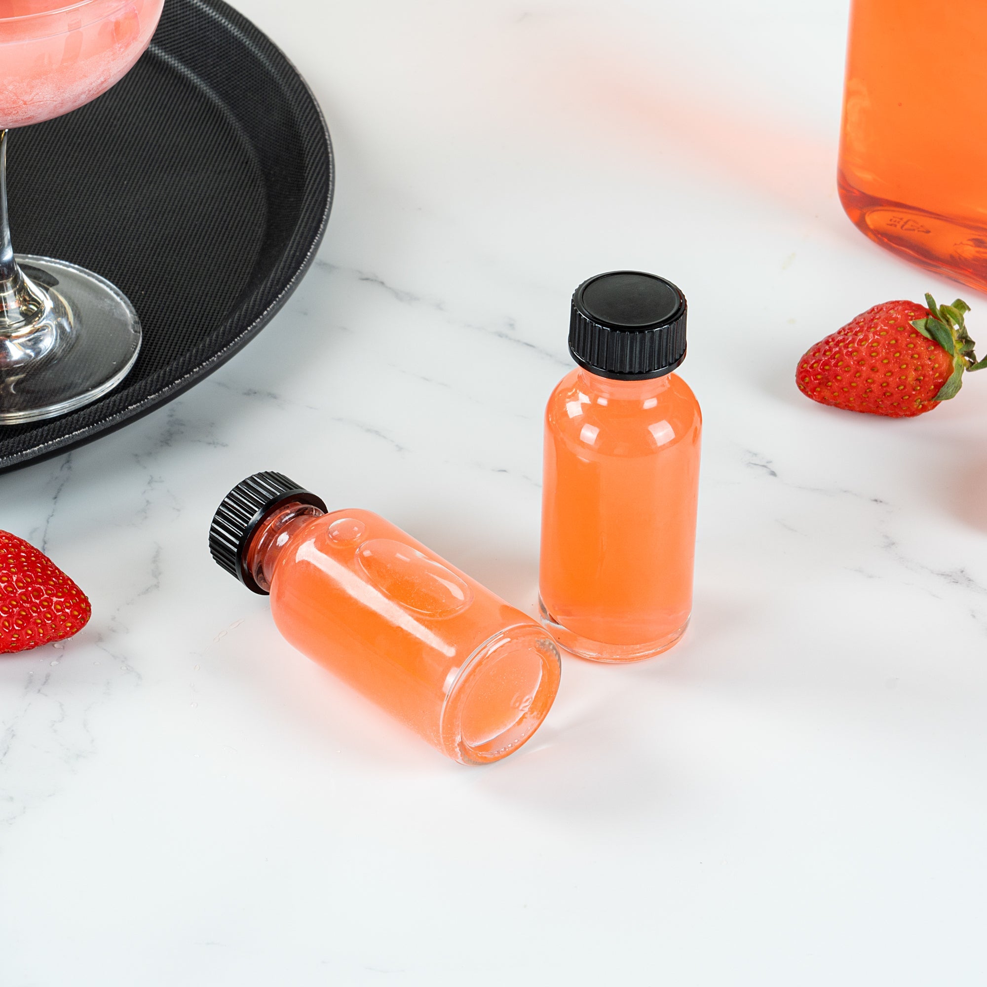 Vetri 1 oz Boston Round Clear Glass Bottle - with Black Phenolic Cap - 1 1/4" x 1 1/4" x 3" - 48 count box