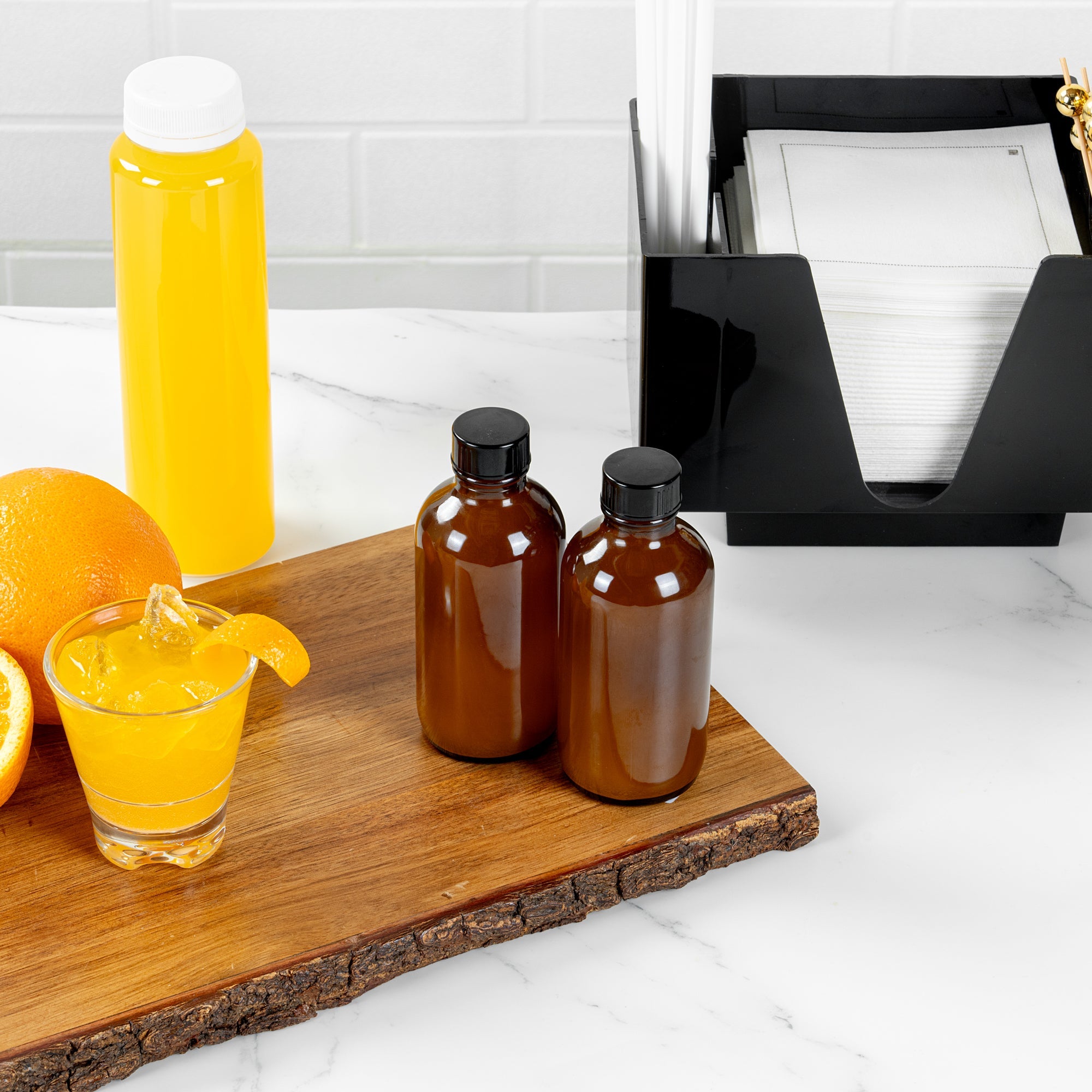 Vetri 4 oz Boston Round Amber Glass Bottle - with Black Phenolic Cap - 2" x 2" x 4 1/2" - 24 count box