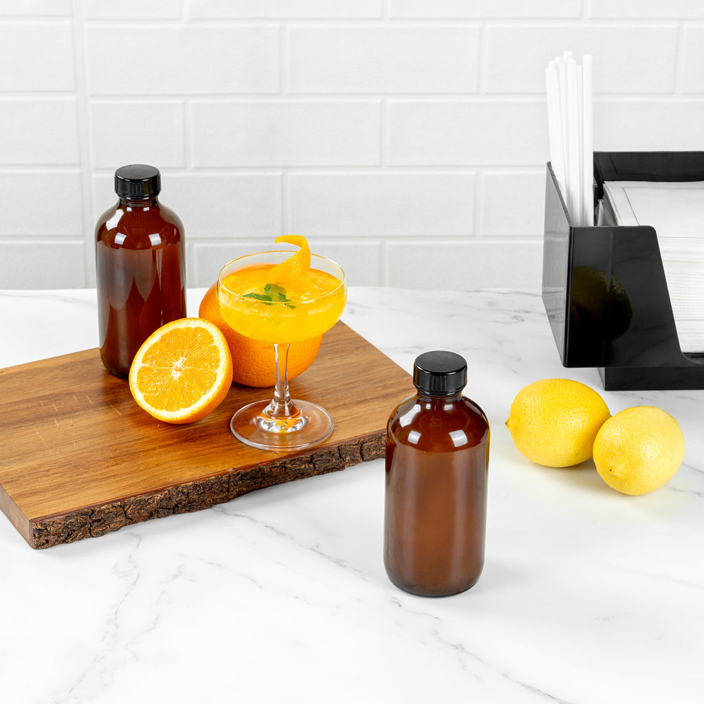 Vetri 8 oz Boston Round Amber Glass Bottle - with Black Phenolic Cap - 2 1/2" x 2 1/2" x 5 1/2" - 12 count box