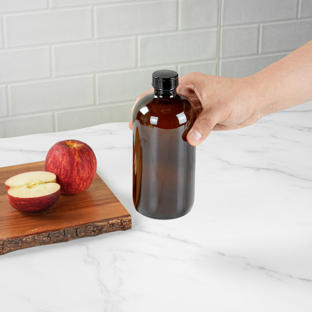 Vetri 16 oz Boston Round Amber Glass Bottle - with Black Phenolic Cap - 3" x 3" x 6 3/4" - 12 count box