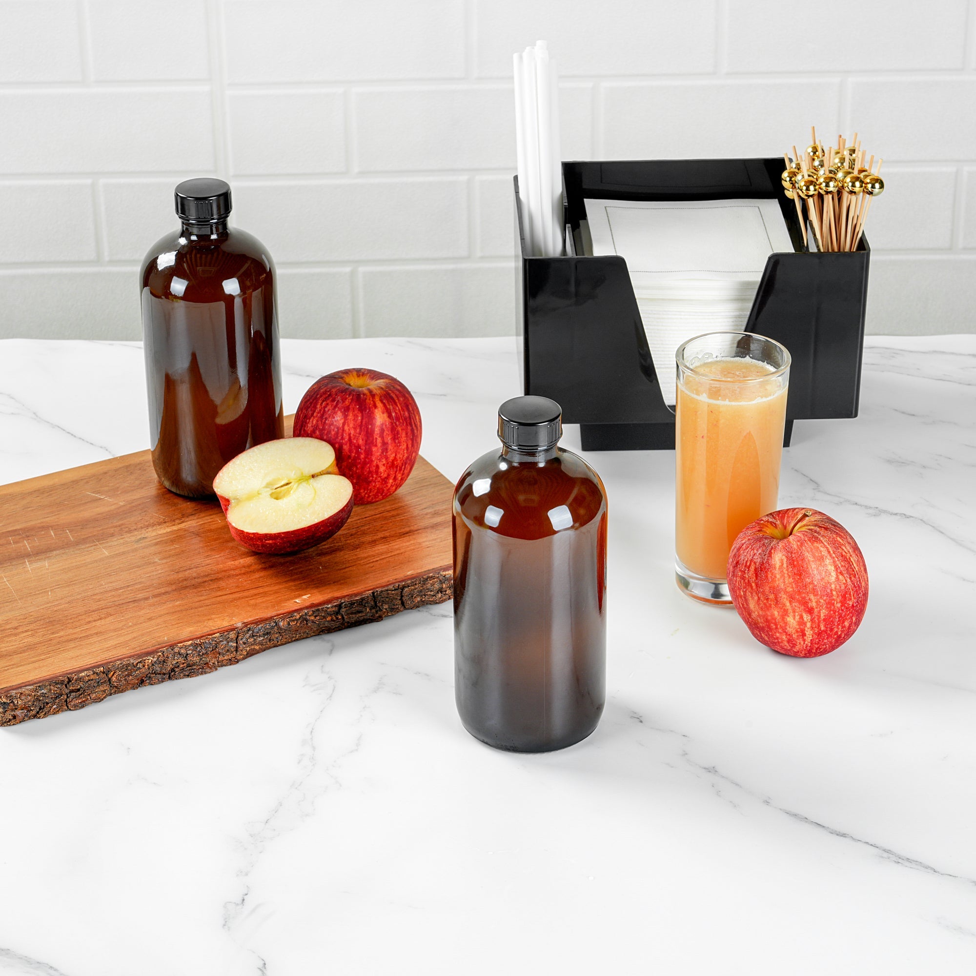 Vetri 16 oz Boston Round Amber Glass Bottle - with Black Phenolic Cap - 3" x 3" x 6 3/4" - 12 count box
