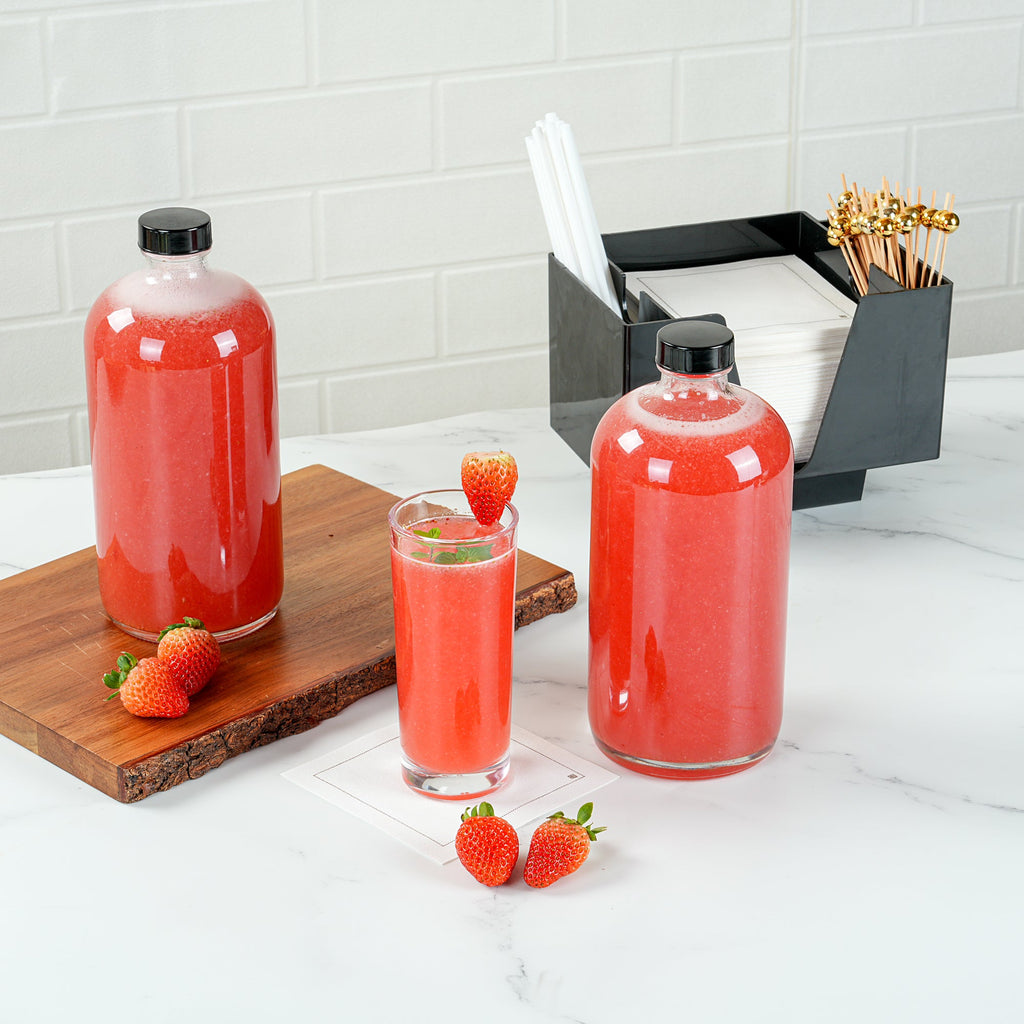 Vetri 32 oz Boston Round Clear Glass Bottle - with Black Phenolic Cap - 3 3/4" x 3 3/4" x 8" - 12 count box