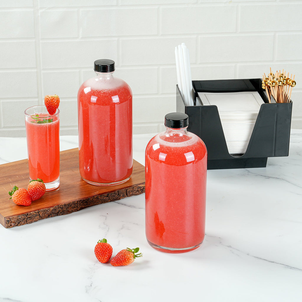 Vetri 32 oz Boston Round Clear Glass Bottle - with Black Phenolic Cap - 3 3/4" x 3 3/4" x 8" - 12 count box