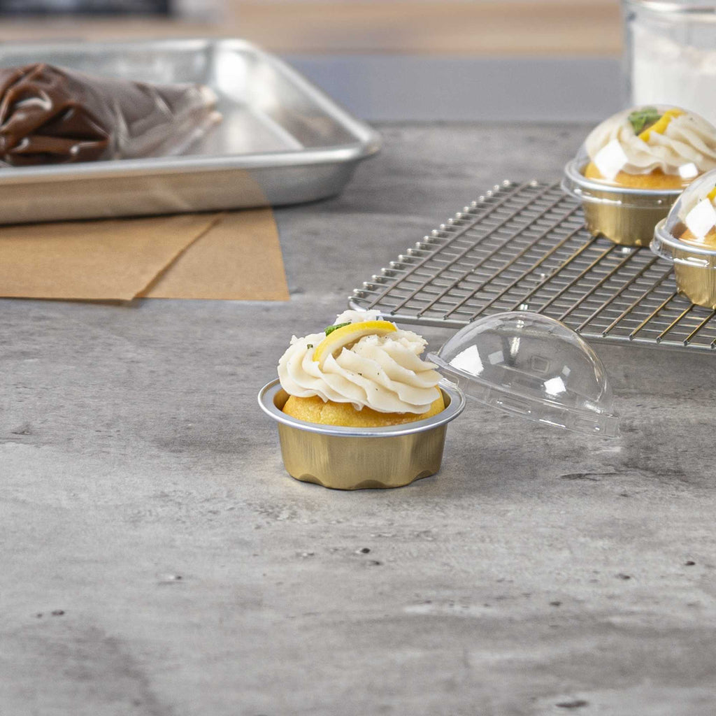 Pastry Tek 2 oz Round Gold Aluminum Baking Cup - with Plastic Dome Lid - 2 3/4" x 2 3/4" x 1" - 100 count box