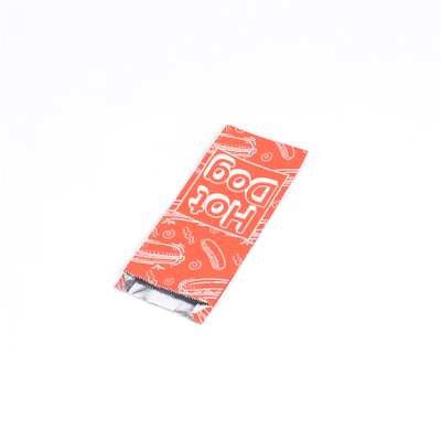 Bag Tek Red Paper Printed Small Hot Dog Foil Bag - 3 3/4" x 1 1/4" x 9" - 100 count box