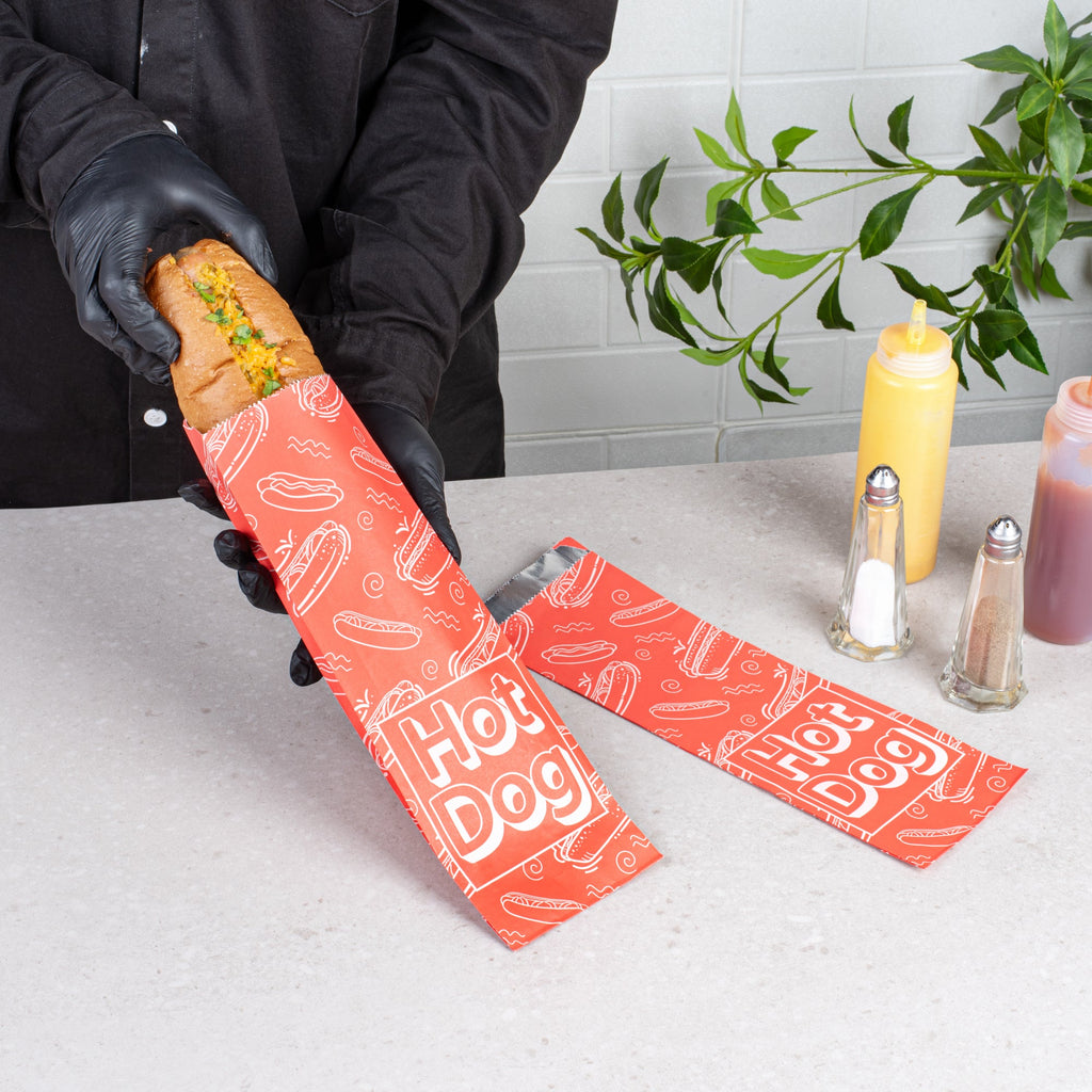 Bag Tek Red Paper Printed Large Hot Dog Foil Bag - 3 3/4" x 1 1/4" x 12" - 100 count box