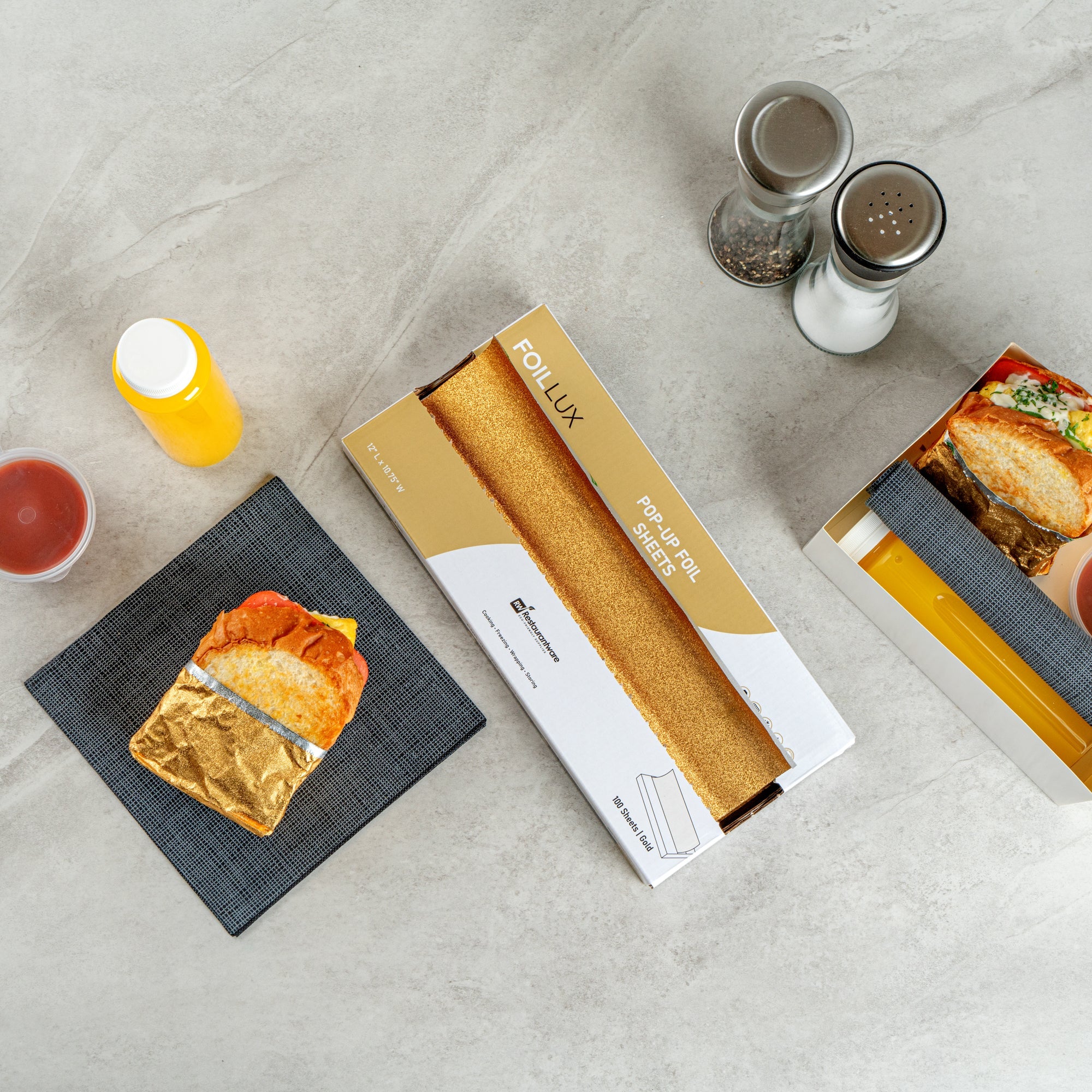 Foil Lux Foodservice Gold Aluminum Foil Pop-Up Sheet - Interfolded, Embossed - 12" x 10 3/4" - 100 count box