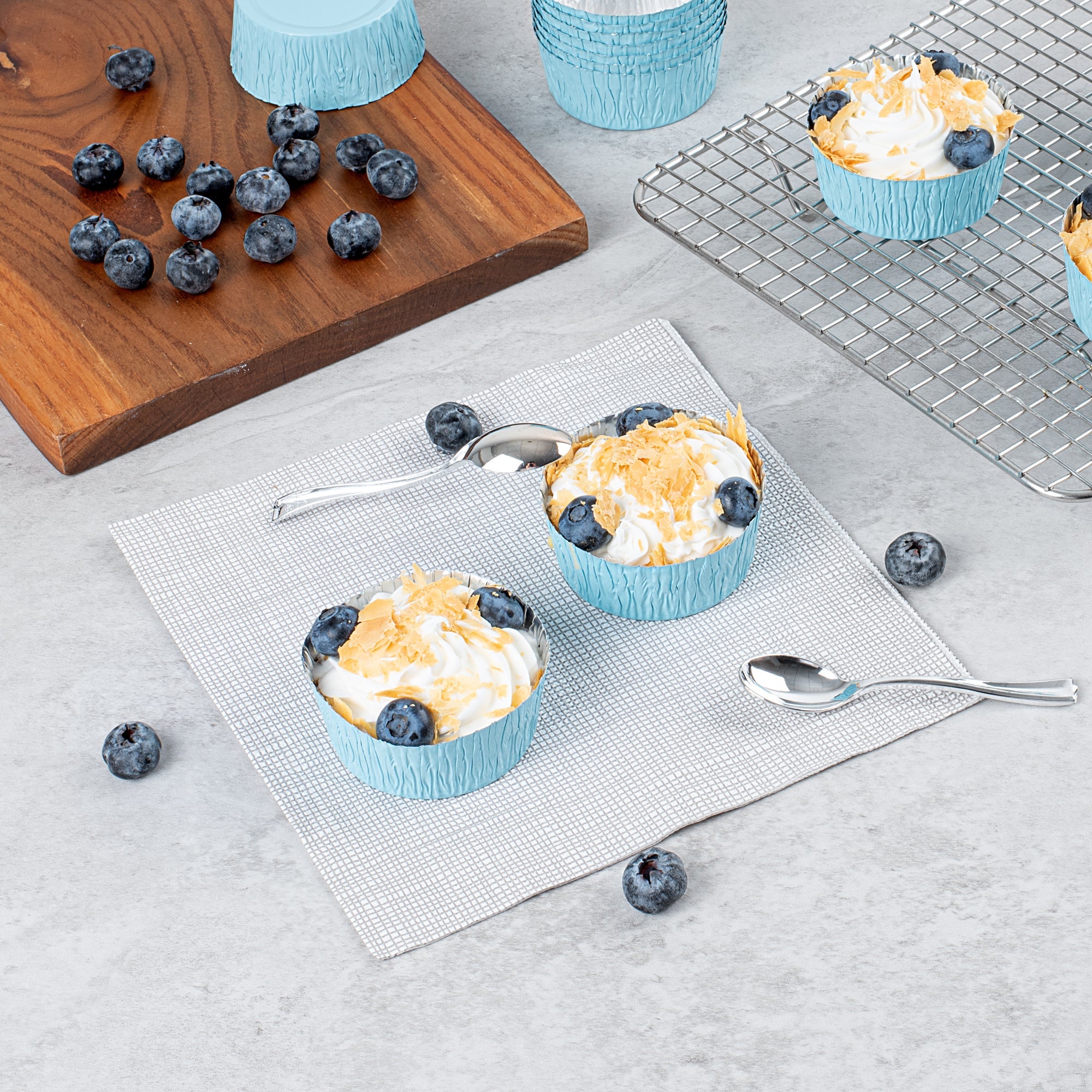 Pastry Tek 3 oz Round Blue Foil Ramekin Cup - 3/4" x 3/4" x 1/2" - 200 count box