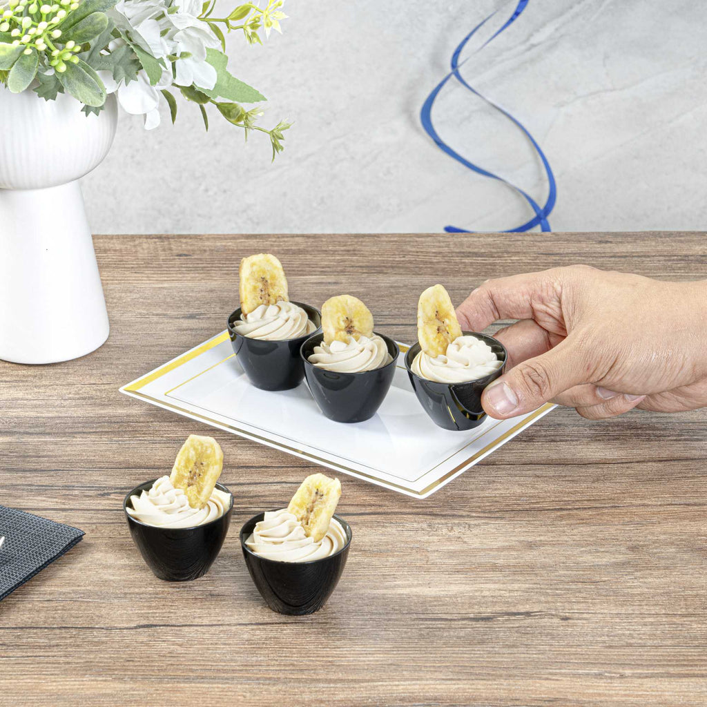 Mini Serve 2 oz Round Black Plastic Mini Tasting Bowl - 2" x 2" x 1 1/2" - 100 count box