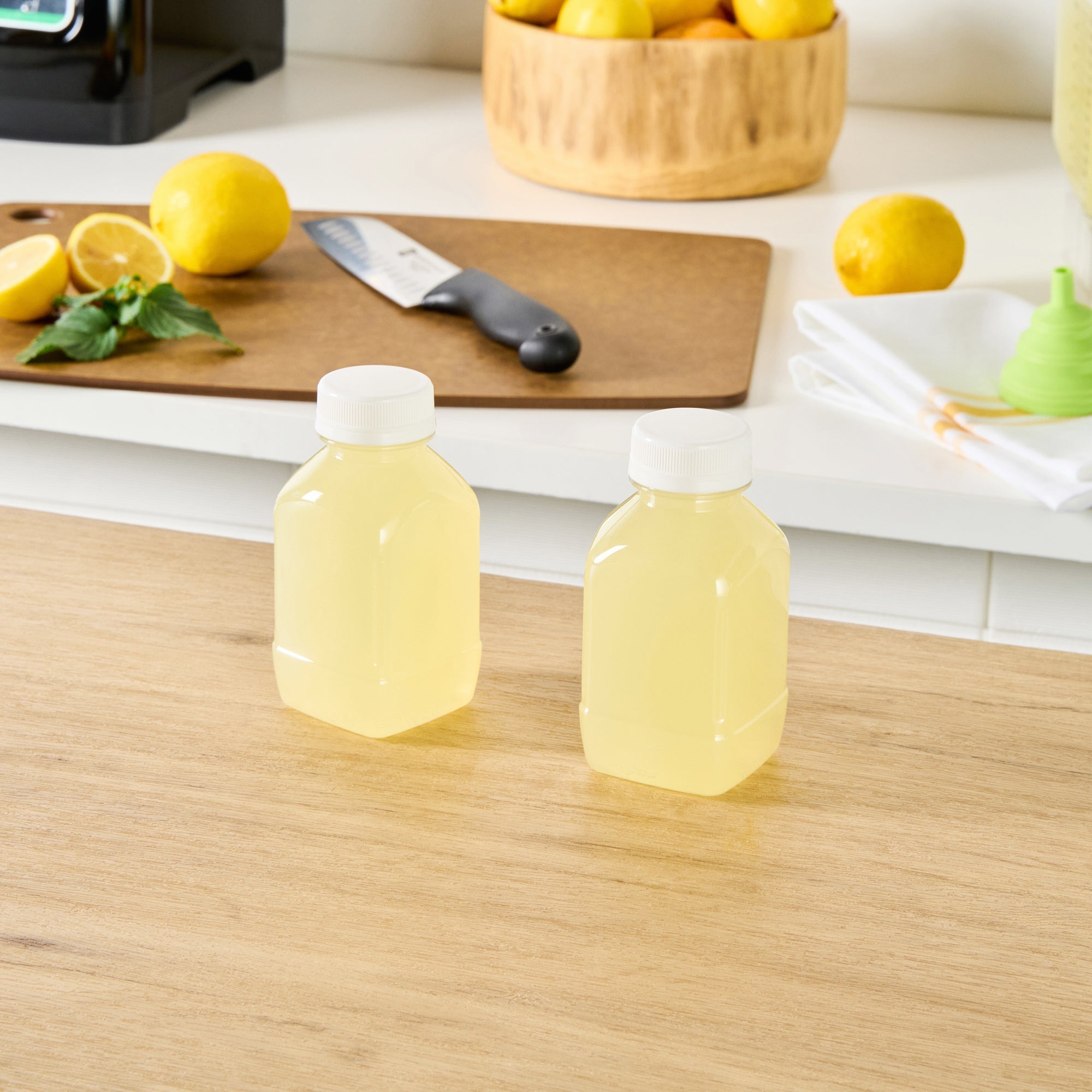 Bottle Tek 8 oz Square Clear Plastic Cold Pressed Juice Bottle - with Safety Cap - 2 1/4" x 2 1/4" x 4 3/4" - 100 count box
