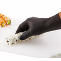 Fashion Serve Black Plastic Medium Nitrile Gloves - Powder Free - 9" x 3 3/4" - 100 count box