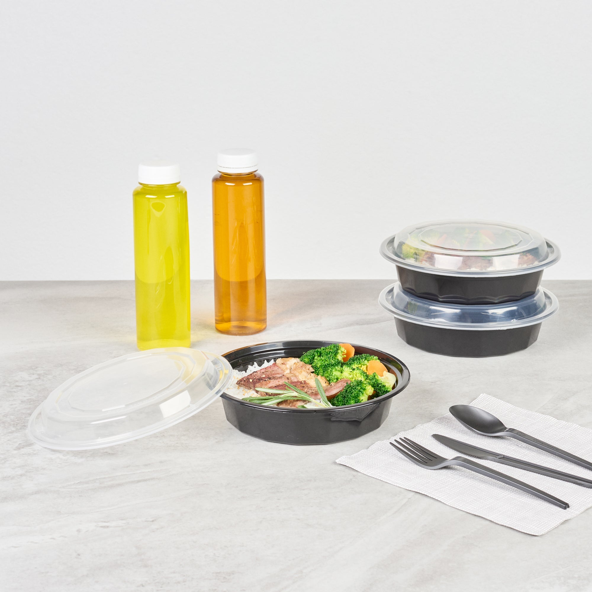 Asporto 24 oz Round Black Plastic To Go Box - with Clear Lid, Microwavable - 7 1/4" x 7 1/4" x 1 1/2" - 100 count box