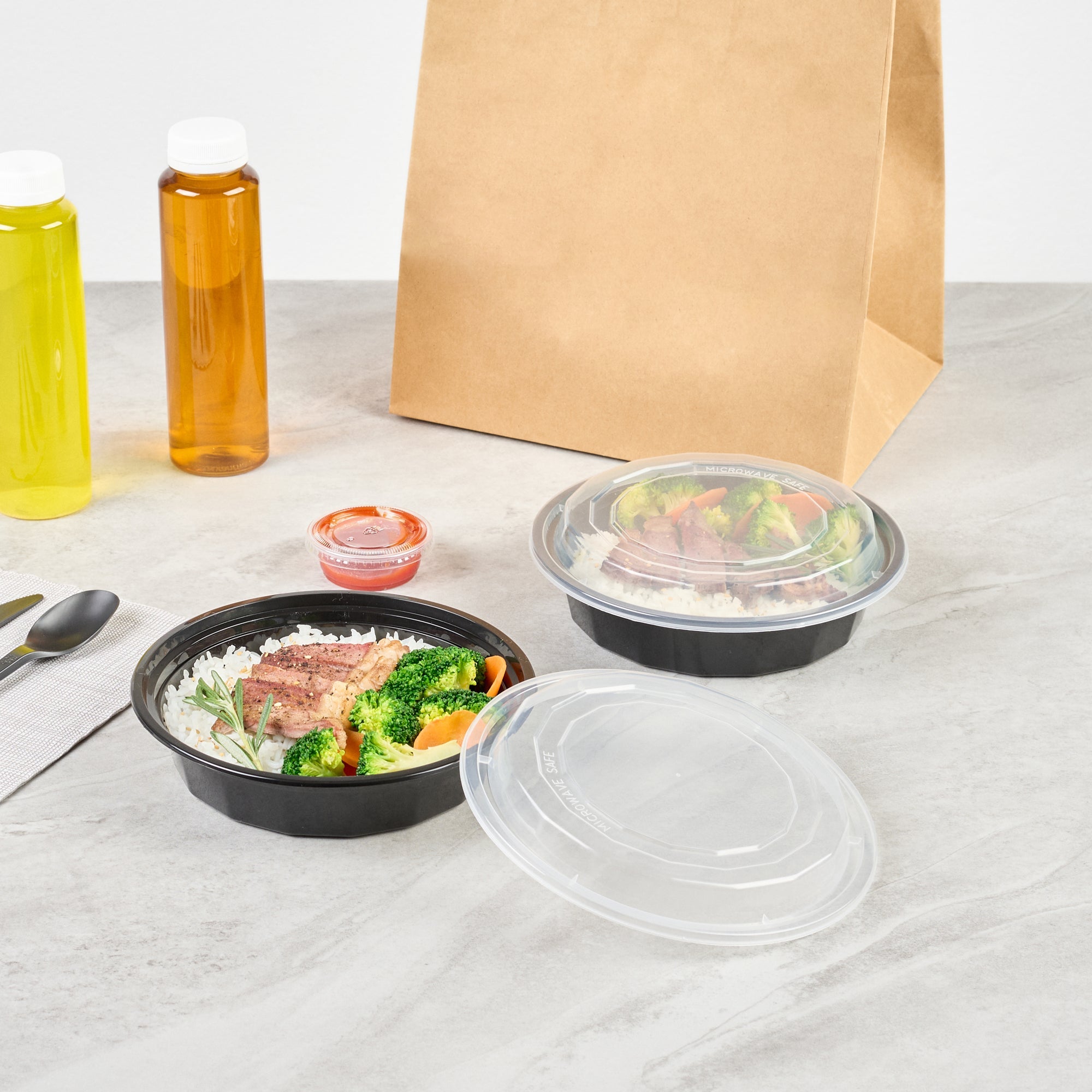 Asporto 24 oz Round Black Plastic To Go Box - with Clear Lid, Microwavable - 7 1/4" x 7 1/4" x 1 1/2" - 100 count box