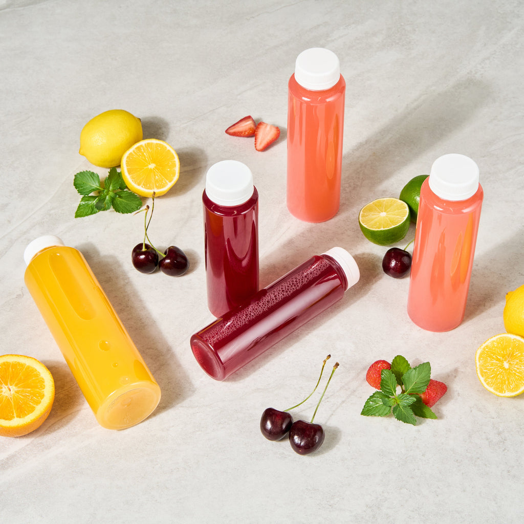 Bottle Tek 8 oz Round Clear Plastic Cold Pressed Juice Bottle - with Safety Cap - 2" x 2" x 6 3/4" - 100 count box