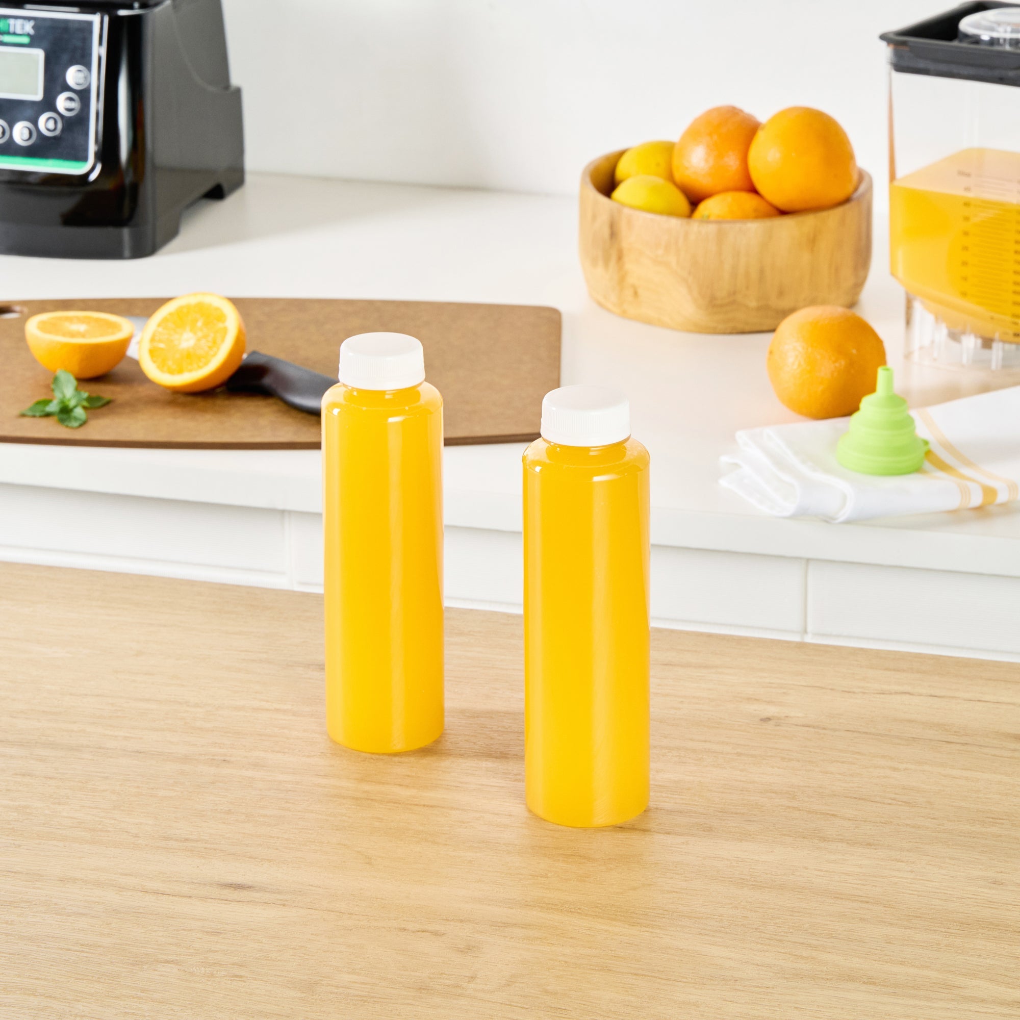 Bottle Tek 16 oz Round Clear Plastic Cold Pressed Juice Bottle - with Safety Cap - 2 1/4" x 2 1/4" x 8 1/4" - 100 count box