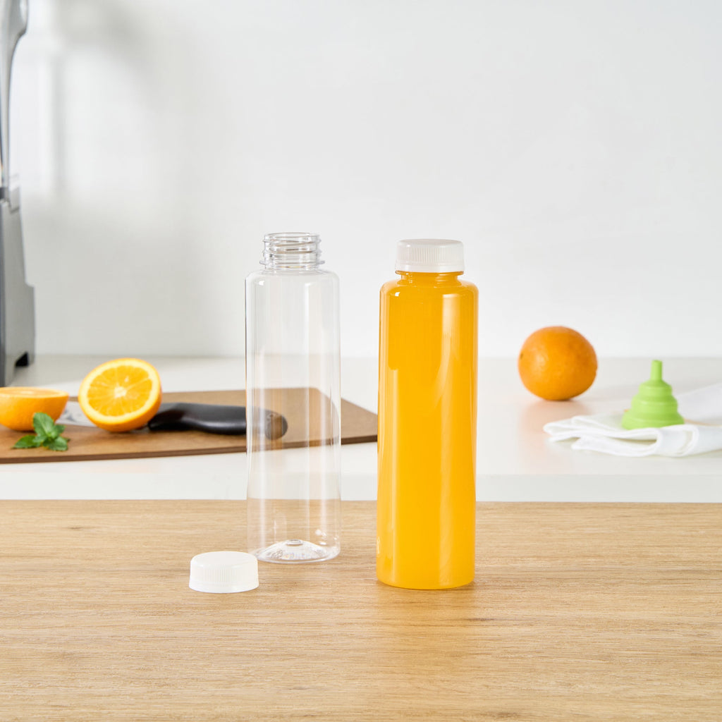 Bottle Tek 16 oz Round Clear Plastic Cold Pressed Juice Bottle - with Safety Cap - 2 1/4" x 2 1/4" x 8 1/4" - 100 count box