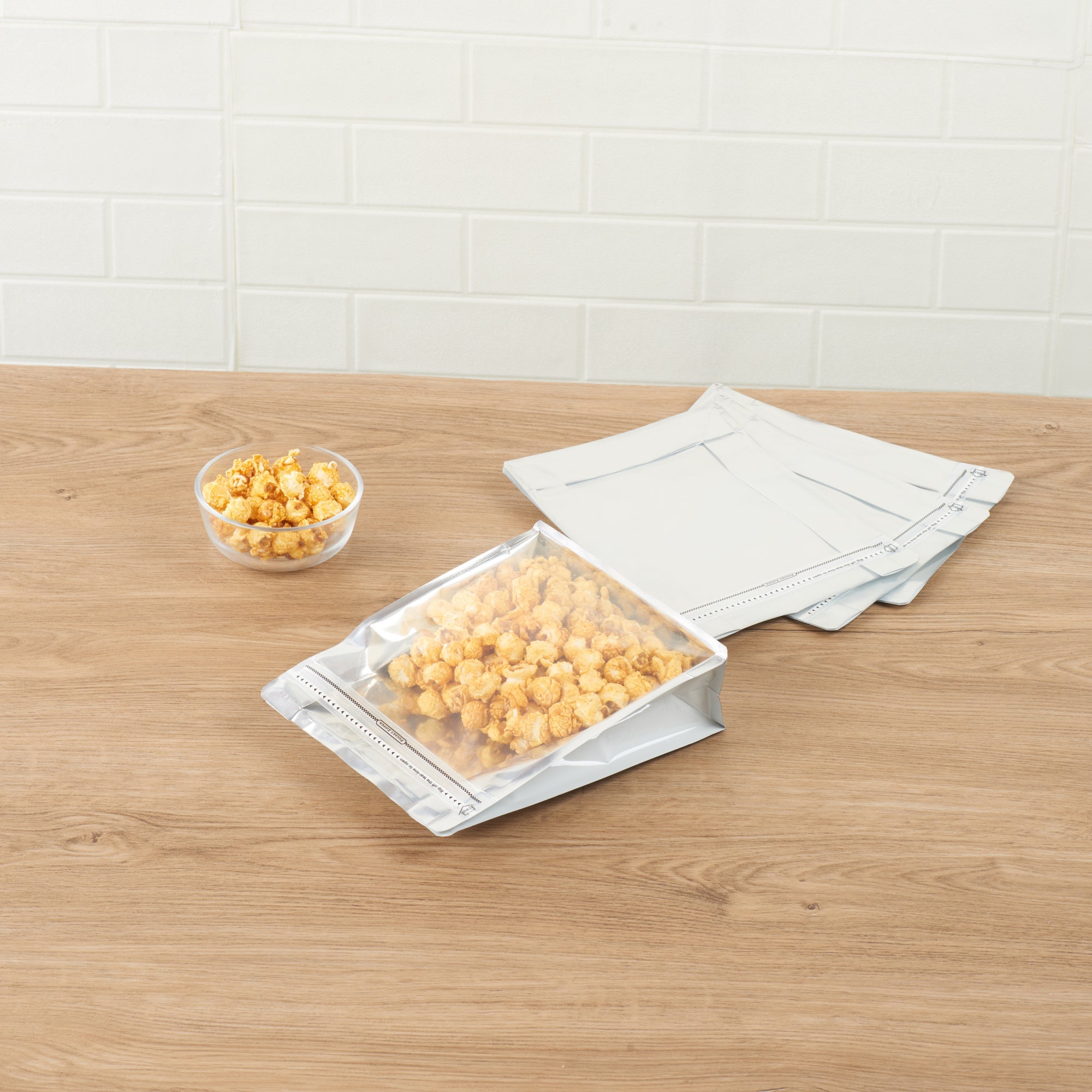 Bag Tek White Plastic Large Snack Bag - Double Seal, Rip Lock, Heat Sealable - 9 1/2" x 7 1/2" x 2 3/4" - 100 count box