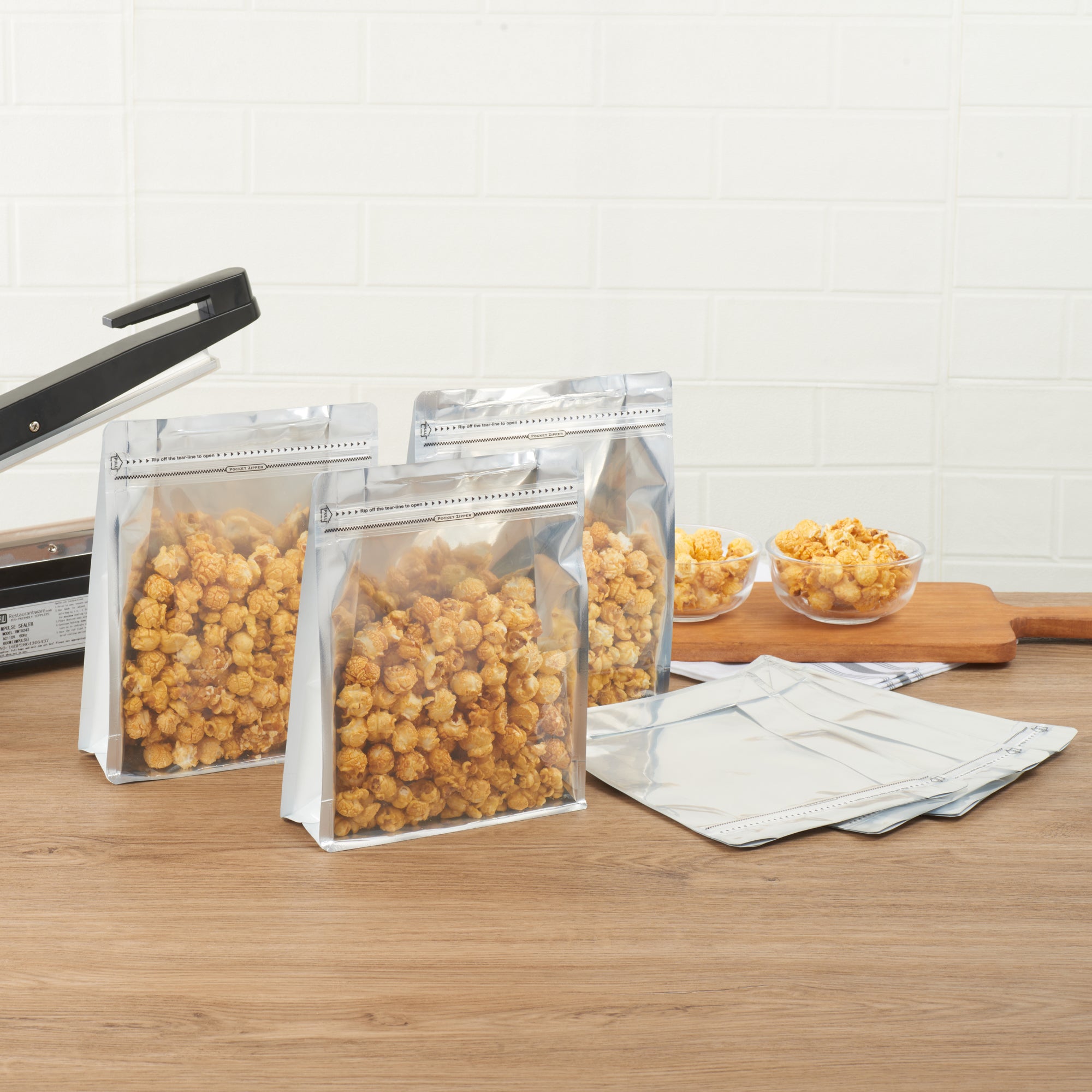 Bag Tek White Plastic Large Snack Bag - Double Seal, Rip Lock, Heat Sealable - 9 1/2" x 7 1/2" x 2 3/4" - 100 count box