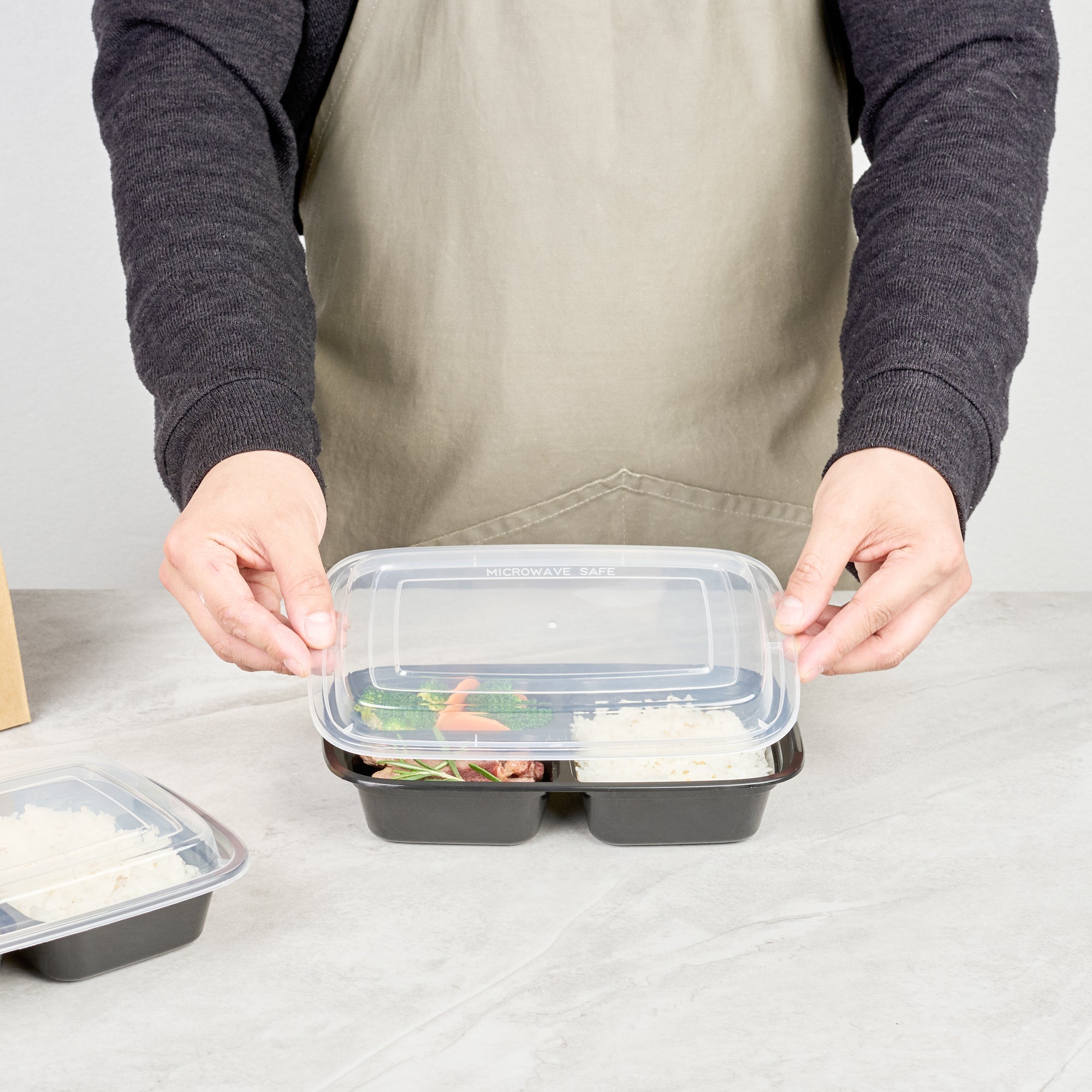 Asporto 26 oz Black Plastic 3 Compartment Food Container - with Clear Lid, Microwavable - 8 3/4" x 6" x 1 3/4" - 50 count box