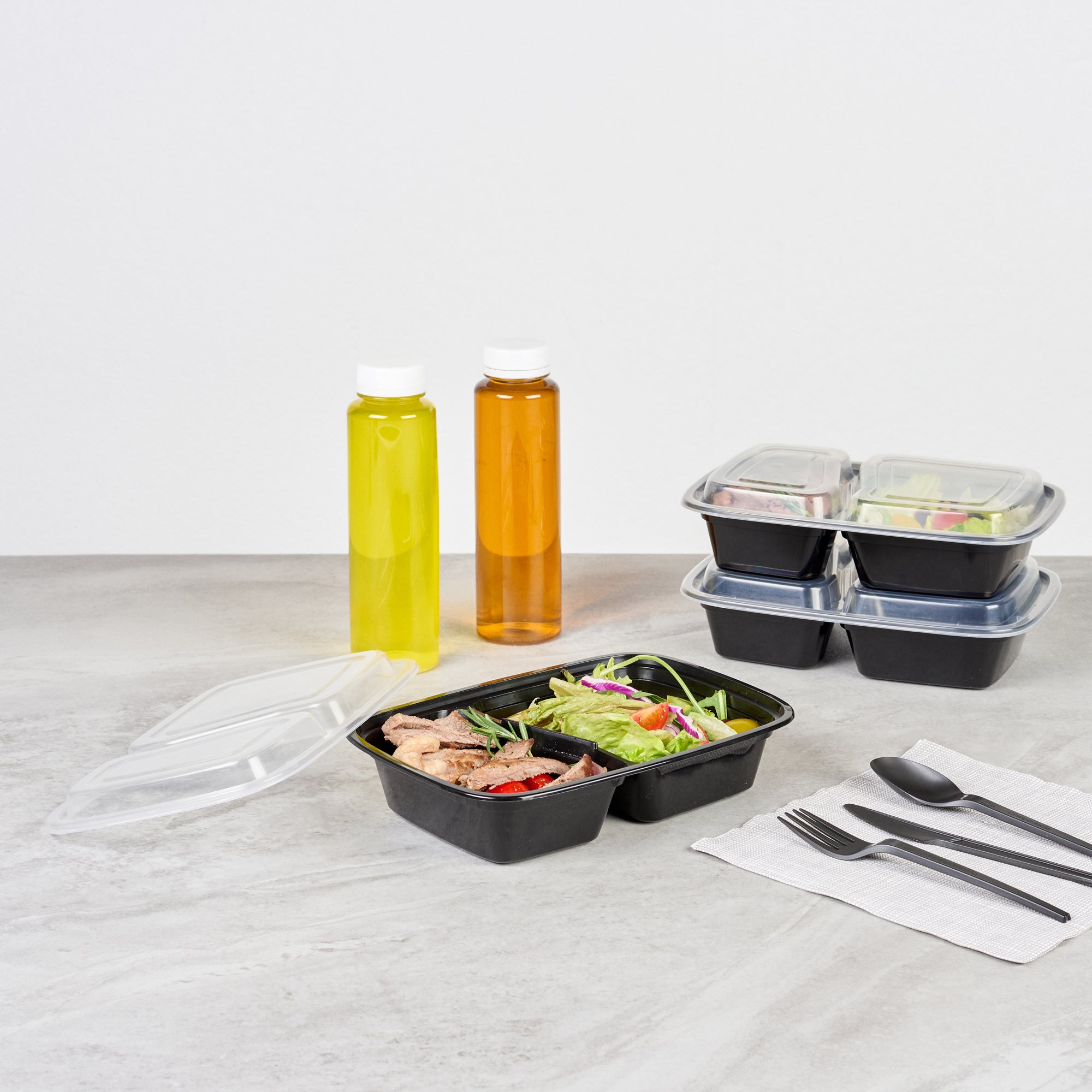 Asporto 32 oz Black Plastic 2 Compartment Food Container - with Clear Lid, Microwavable - 8 3/4" x 6" x 2" - 50 count box