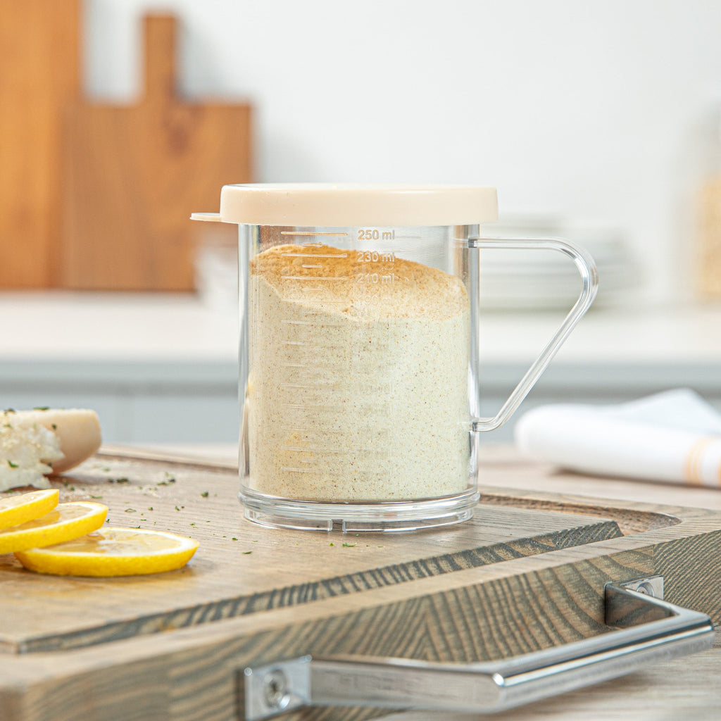 Chef 101 10 oz Clear Polycarbonate Dredge Spice Shaker - with Beige Fine Lid - 4 3/4" x 3 1/4" x 4" - 1 count box