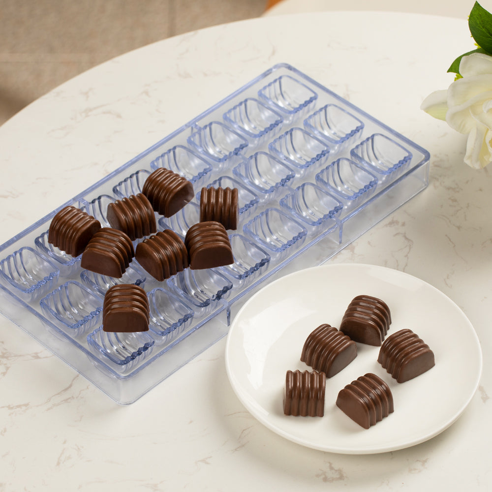 Pastry Tek Polycarbonate Ridged Cylinder Candy / Chocolate Mold - 24-Compartment - 1 count box