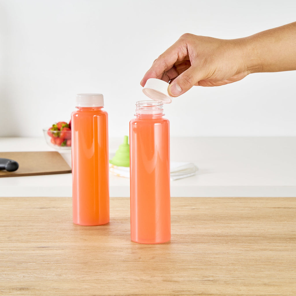 Bottle Tek 12 oz Round Clear Plastic Cold Pressed Juice Bottle - with Safety Cap - 2" x 2" x 7 1/4" - 100 count box