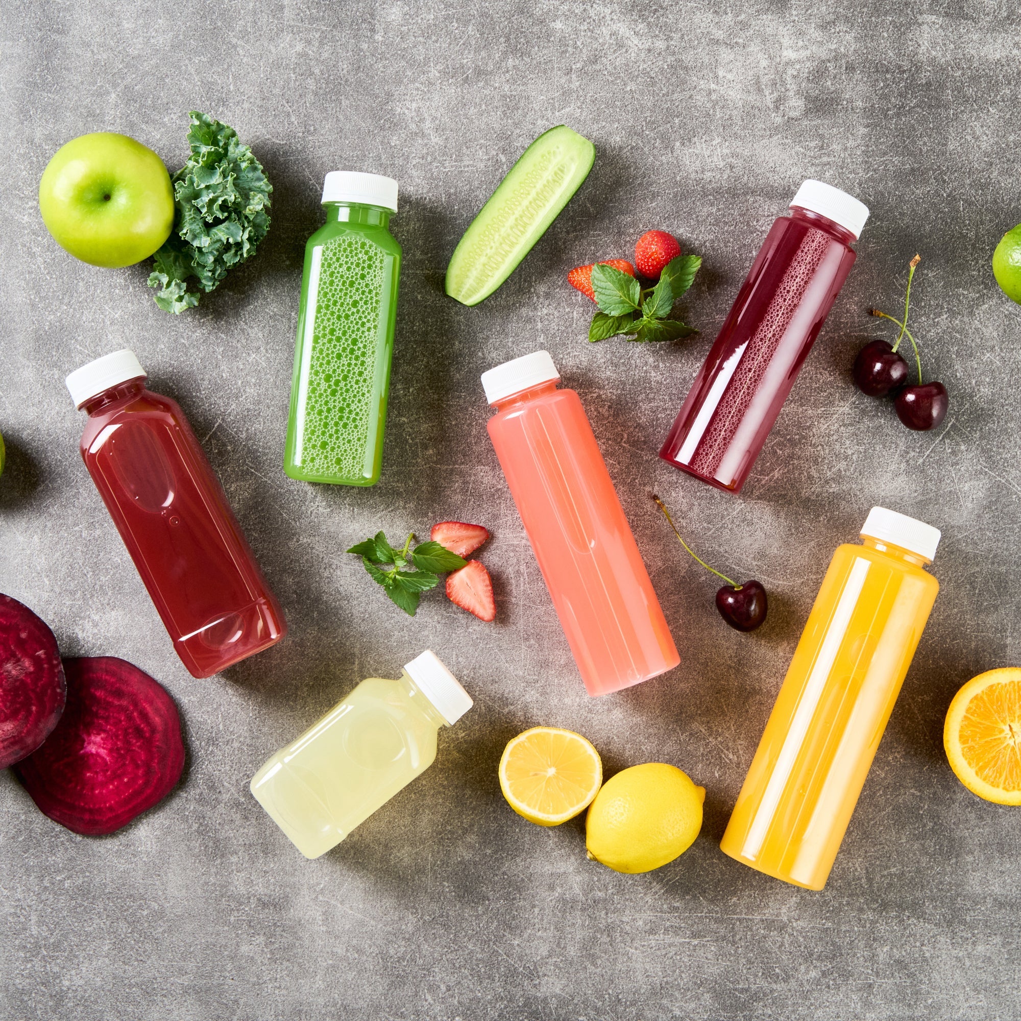 Bottle Tek 12 oz Round Clear Plastic Cold Pressed Juice Bottle - with Safety Cap - 2" x 2" x 7 1/4" - 100 count box