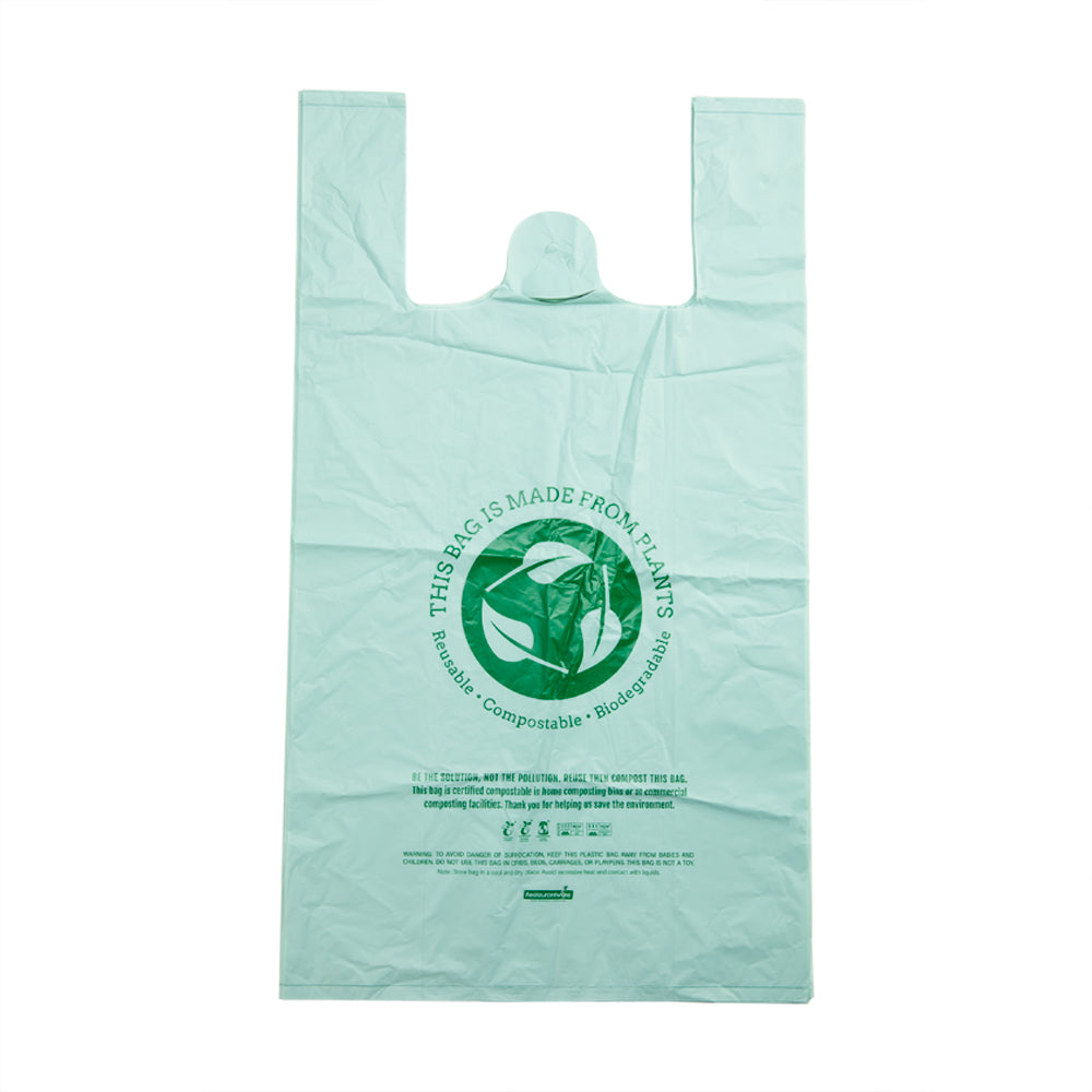 Basic Nature Green Plastic T-Shirt Bag - 1/6 Size, Compostable - 12" x 6 1/2" x 22" - 100 count box