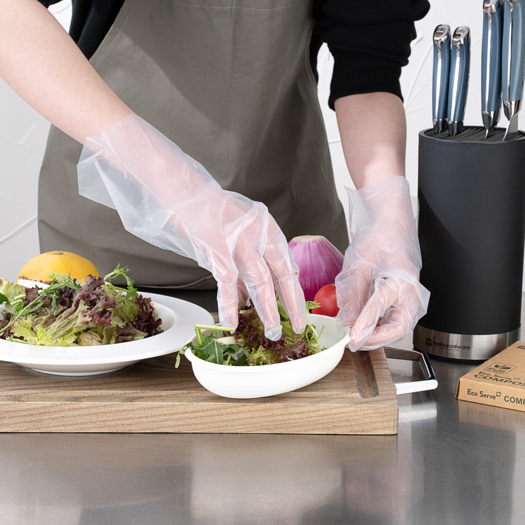 Eco Serve Clear Plastic Medium Compostable Gloves - Powder-Free - 11" x 9" - 100 count box