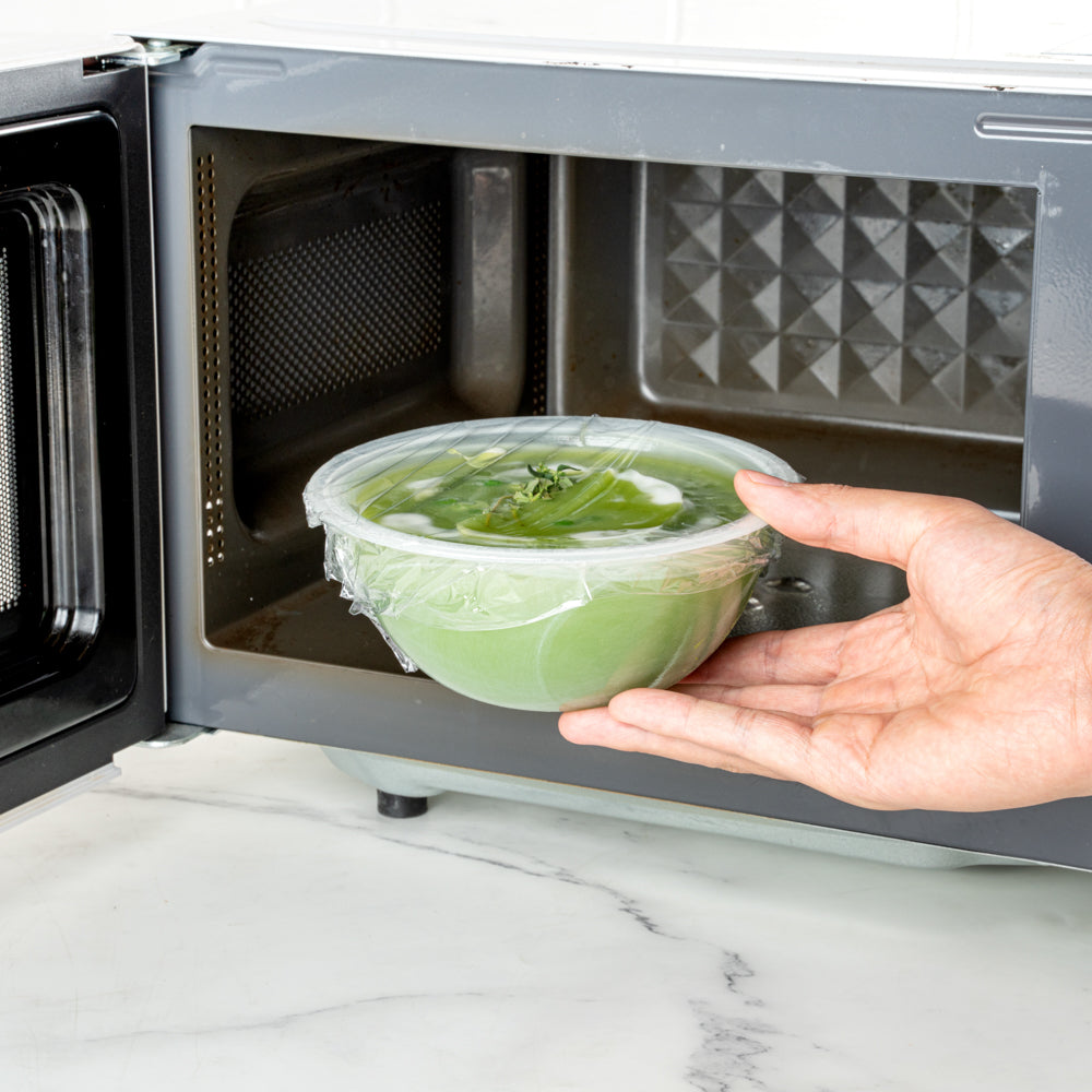 Basic Nature Clear Plastic Foodservice Food Wrap - Home Compostable, BPA-Free, Microwave-Safe - 12" x 200' - 1 count box