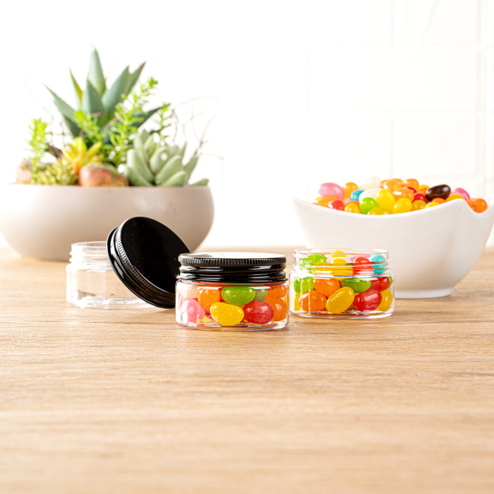 Chef 101 1 oz Round Clear Plastic Candy and Snack Jar - with Black Aluminum Lid - 2" x 2" x 1 1/4" - 10 count box