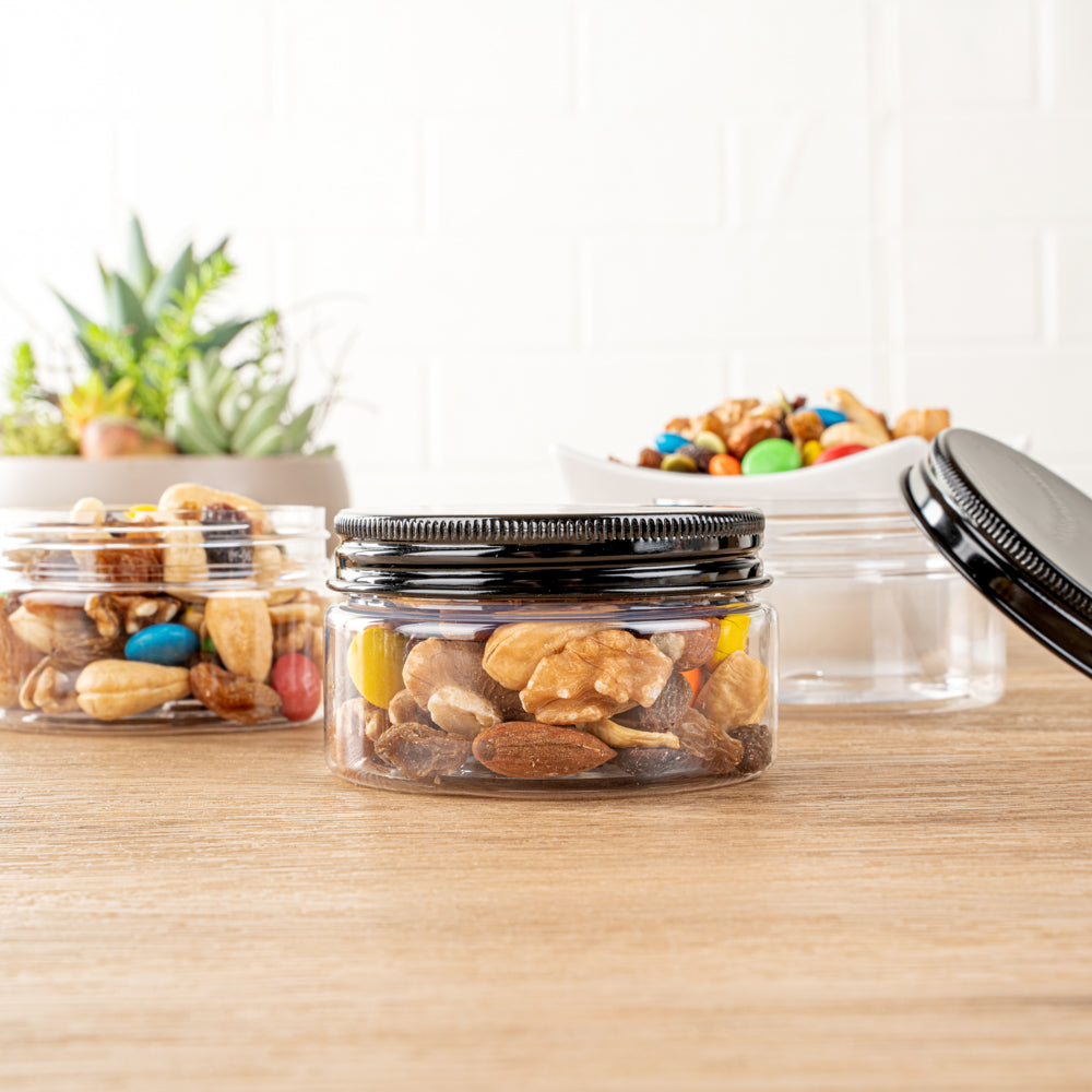 Chef 101 4 oz Round Clear Plastic Candy and Snack Jar - with Black Aluminum Lid - 2 3/4" x 2 3/4" x 1 1/2" - 10 count box