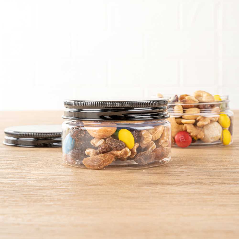 Chef 101 4 oz Round Clear Plastic Candy and Snack Jar - with Black Aluminum Lid - 2 3/4" x 2 3/4" x 1 1/2" - 100 count box