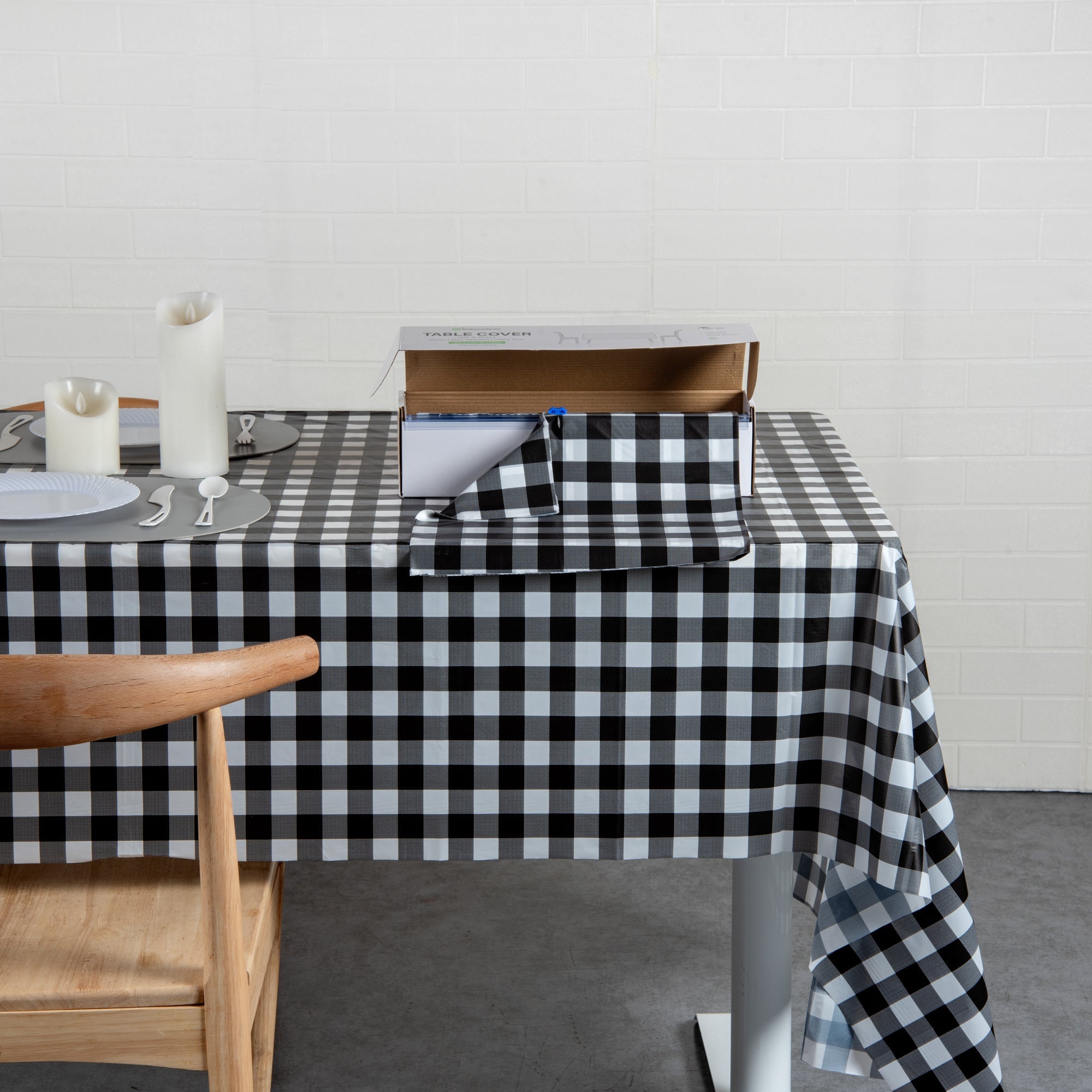 Table Tek Black Gingham Plastic Table Cover Roll - with Slide Cutter - 100' x 54" - 10 count box