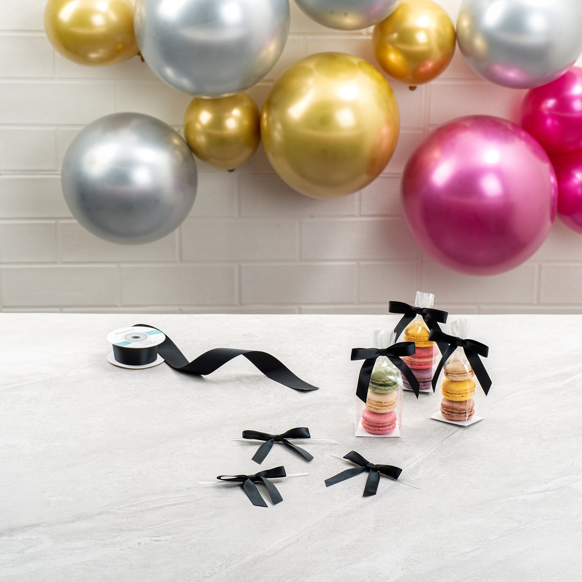 Gift Tek Black Polyester Satin Twist Tie Bow - Pre-Tied - 3" x 2 1/2" - 100 count box