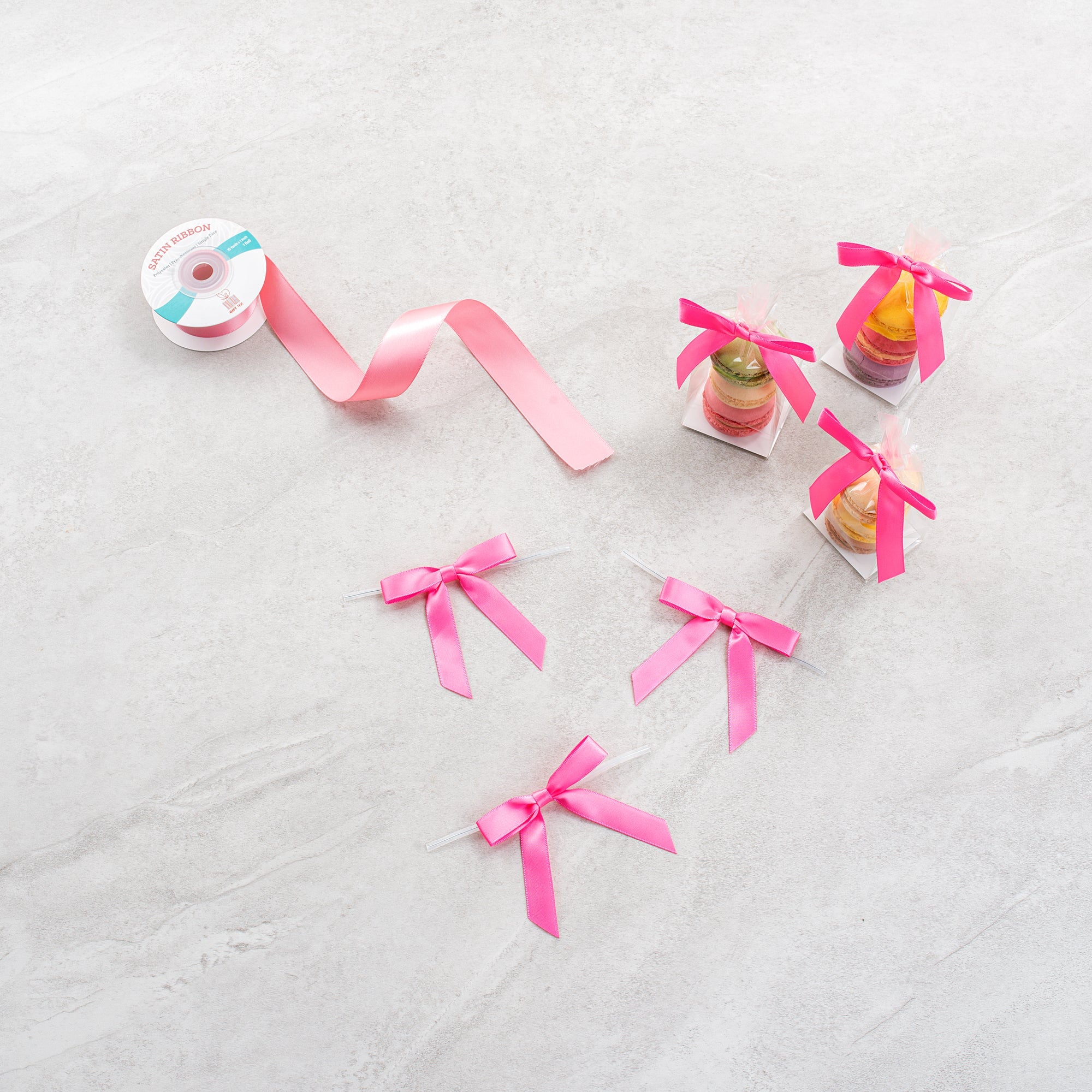 Gift Tek Pink Polyester Satin Twist Tie Bow - Pre-Tied - 3" x 2 1/2" - 100 count box