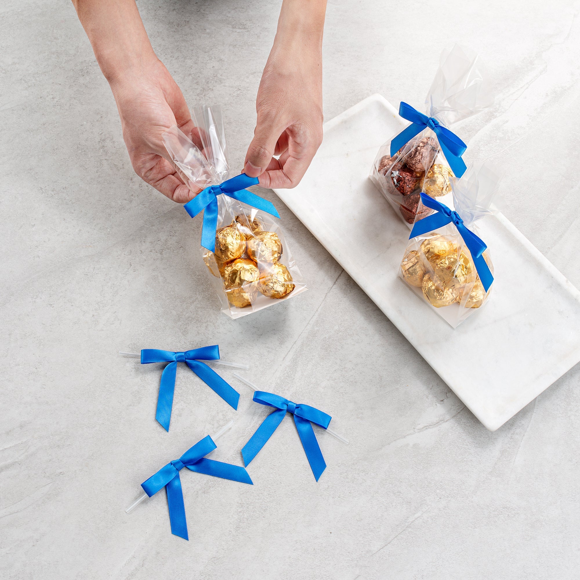 Gift Tek Royal Blue Polyester Satin Twist Tie Bow - Pre-Tied - 3" x 2 1/2" - 4000 count box