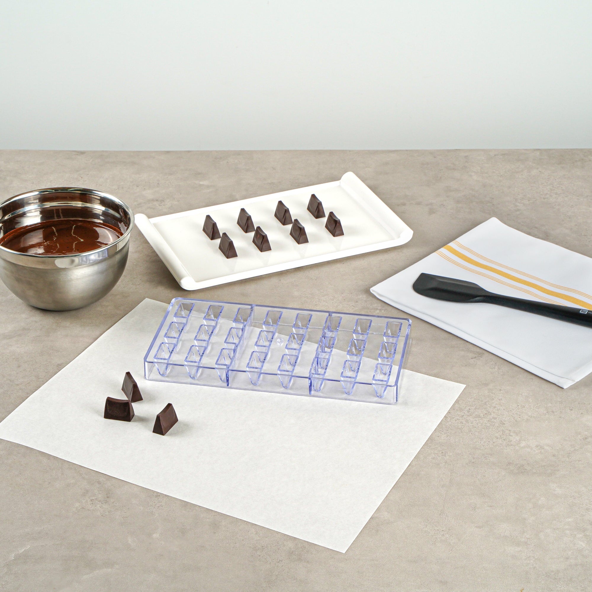 Pastry Tek Polycarbonate Triangle Bar Candy / Chocolate Mold - 24-Compartment - 10 count box