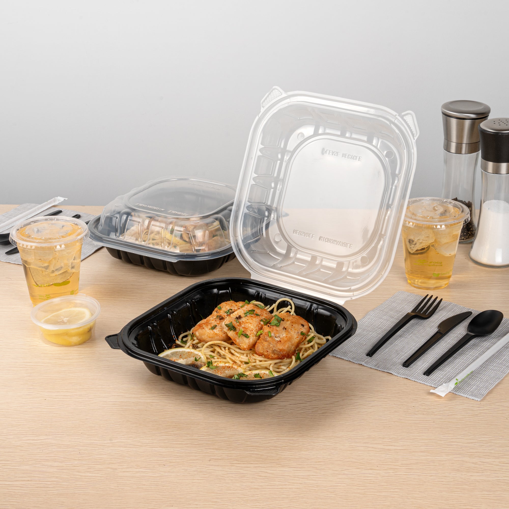 Thermo Tek 40 oz Black Plastic Clamshell Container - Microwavable - 9" x 9" x 3" - 50 count box