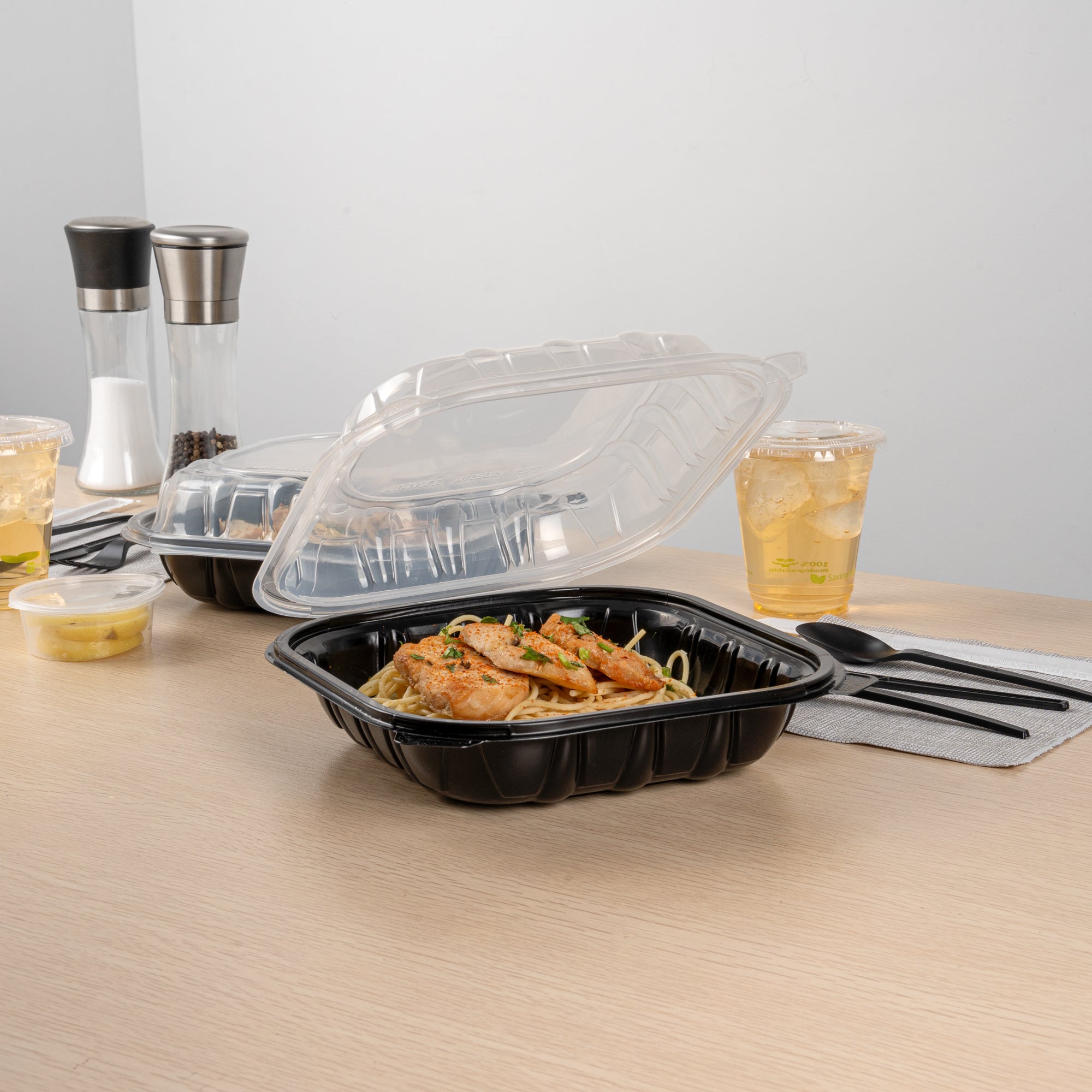 Thermo Tek 40 oz Black Plastic Clamshell Container - Microwavable - 9" x 9" x 3" - 50 count box