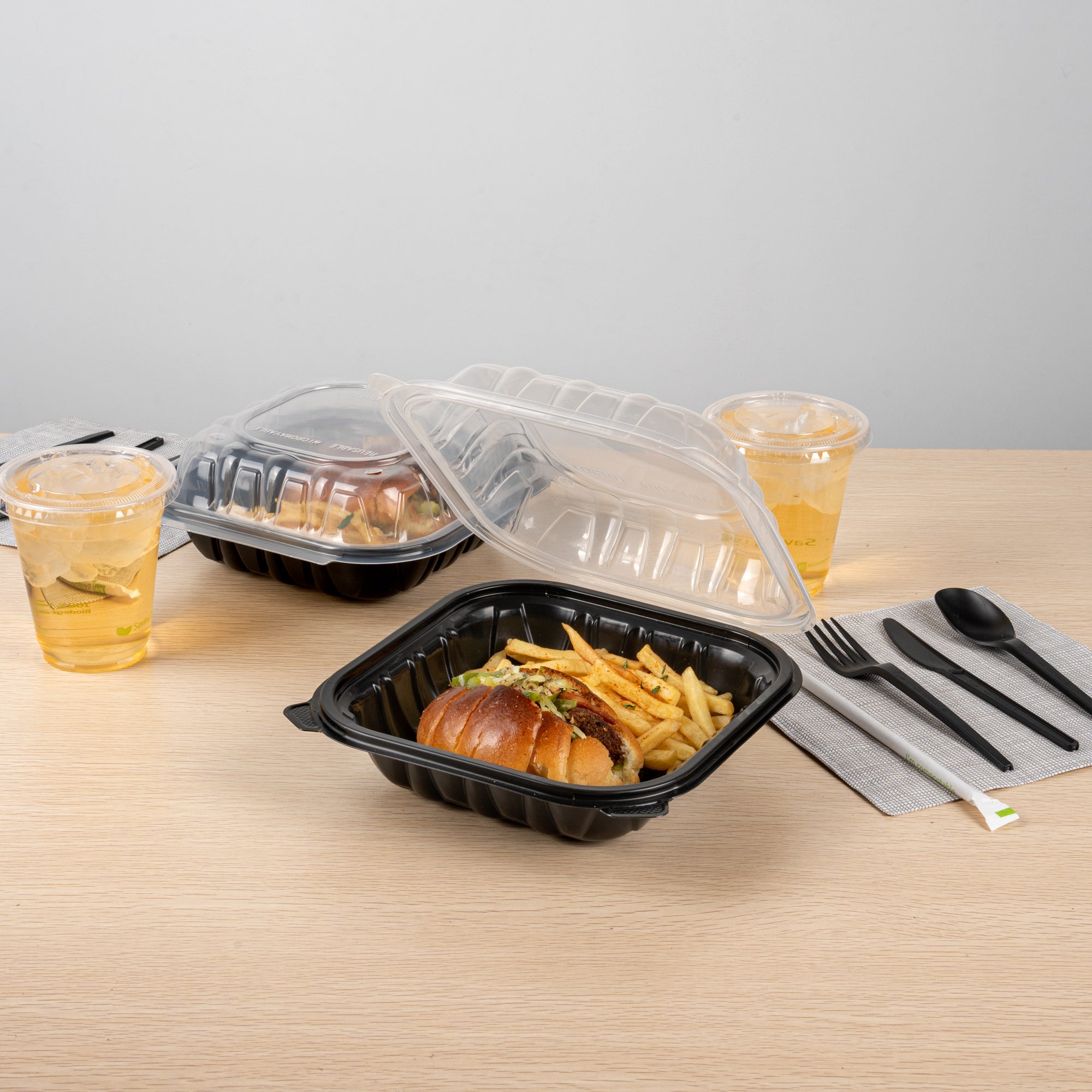 Thermo Tek 34 oz Black Plastic Clamshell Container - Microwavable - 8" x 8" x 3" - 50 count box