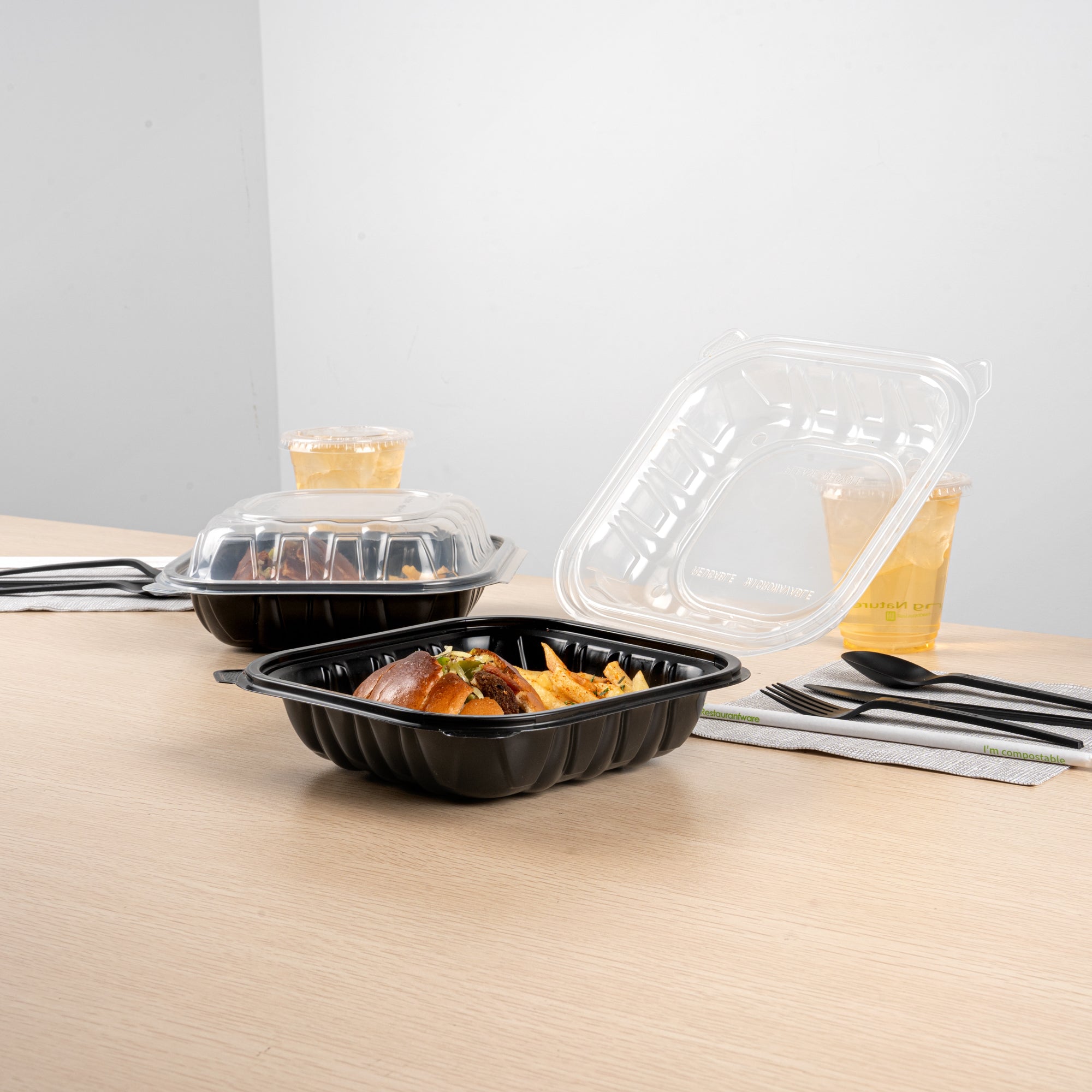 Thermo Tek 34 oz Black Plastic Clamshell Container - Microwavable - 8" x 8" x 3" - 50 count box