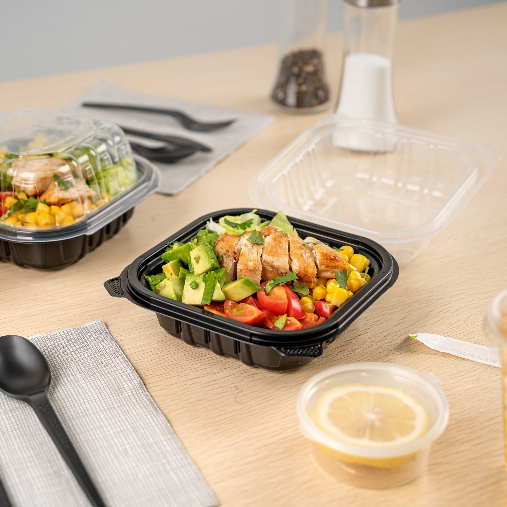 Thermo Tek 16 oz Black Plastic Clamshell Container - Microwavable - 6" x 6" x 3" - 50 count box