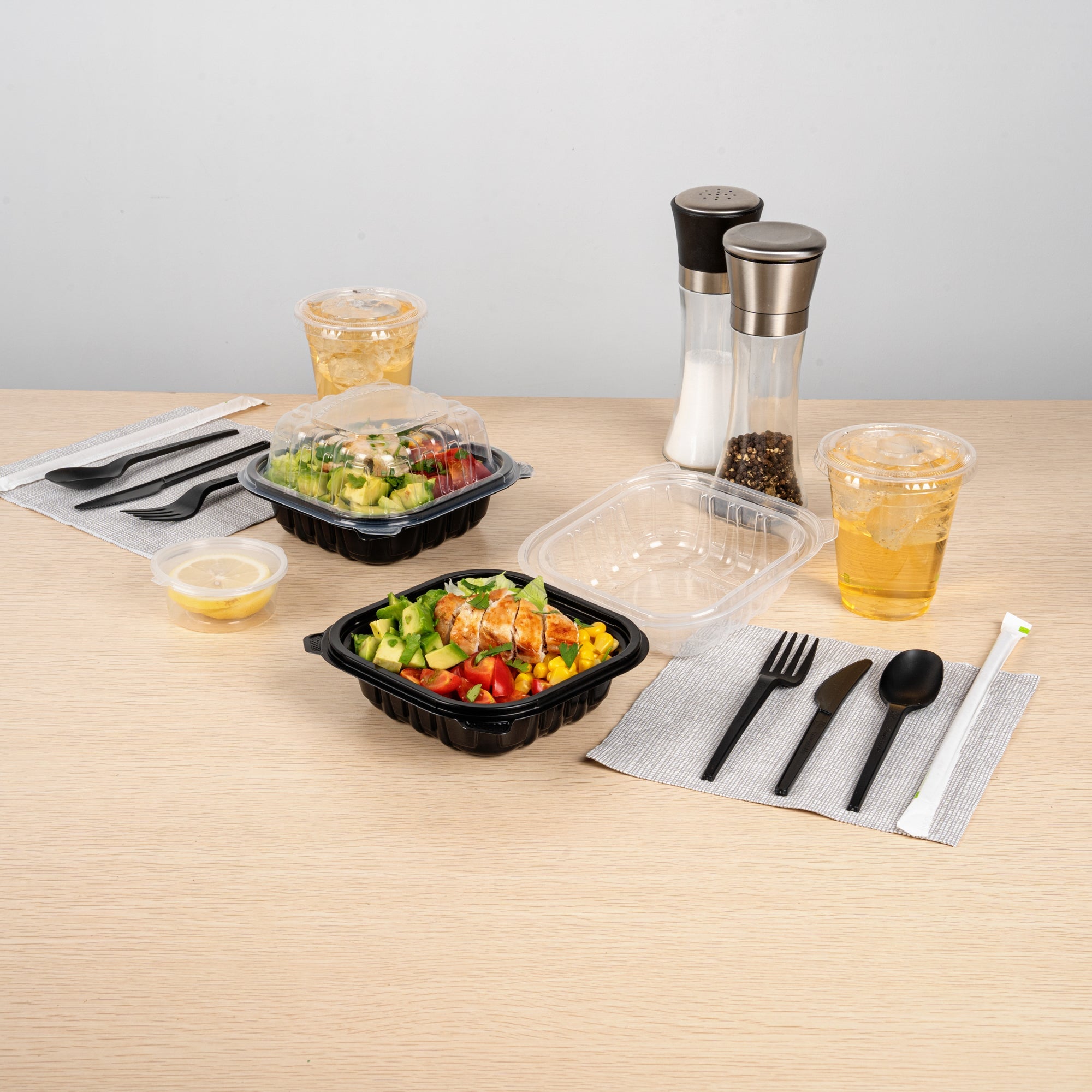 Thermo Tek 16 oz Black Plastic Clamshell Container - Microwavable - 6" x 6" x 3" - 50 count box