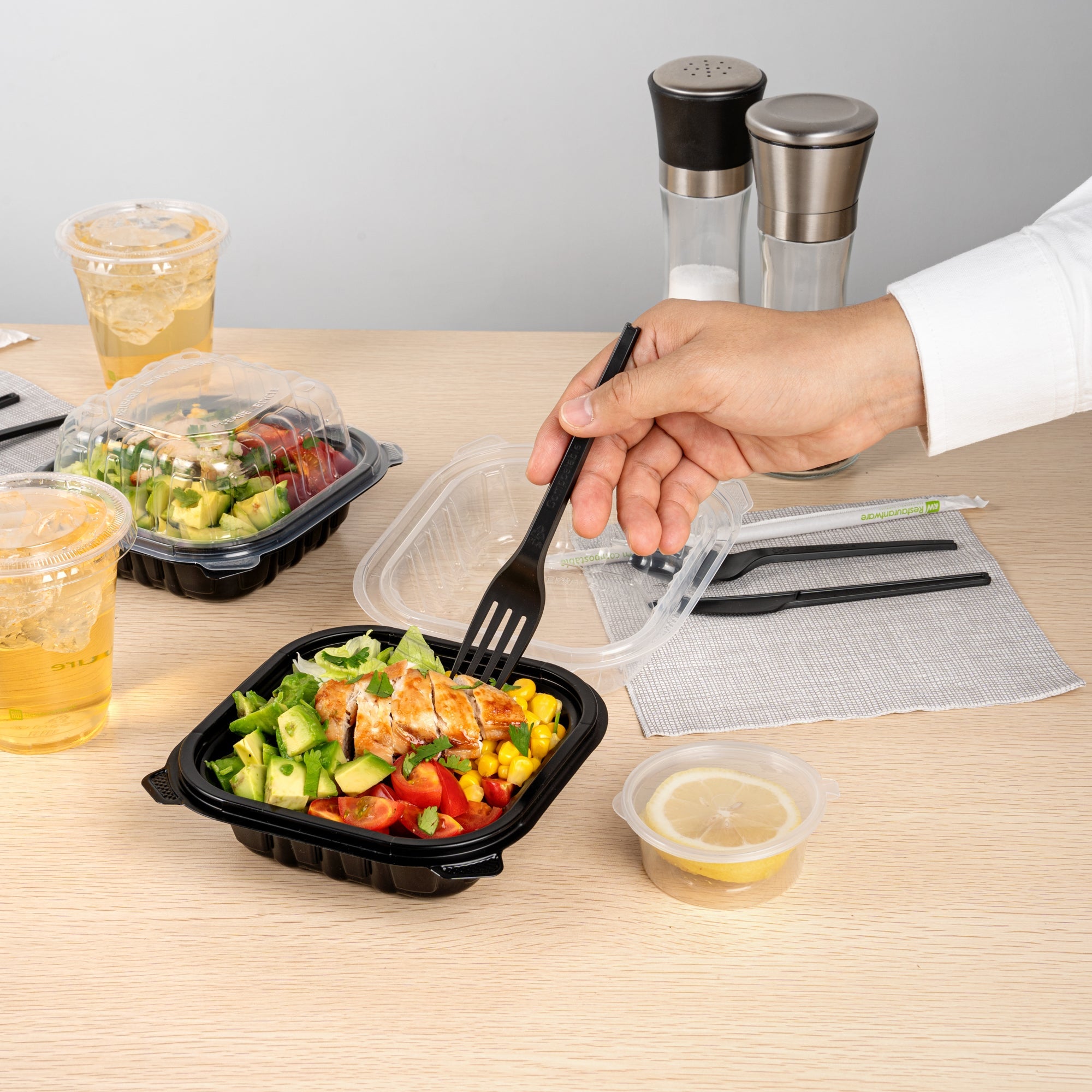 Thermo Tek 16 oz Black Plastic Clamshell Container - Microwavable - 6" x 6" x 3" - 100 count box