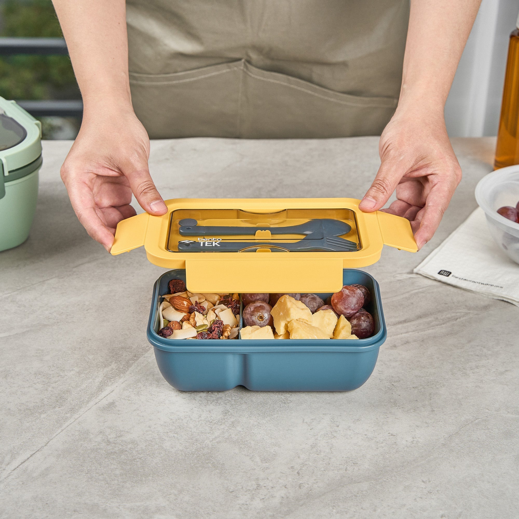 Bento Tek 29 oz Blue and Yellow Lunch Box - BPA-Free, Microwave-Safe, with Fork and Spoon - 7 3/4" x 4 3/4" x 2 3/4" - 10 count box