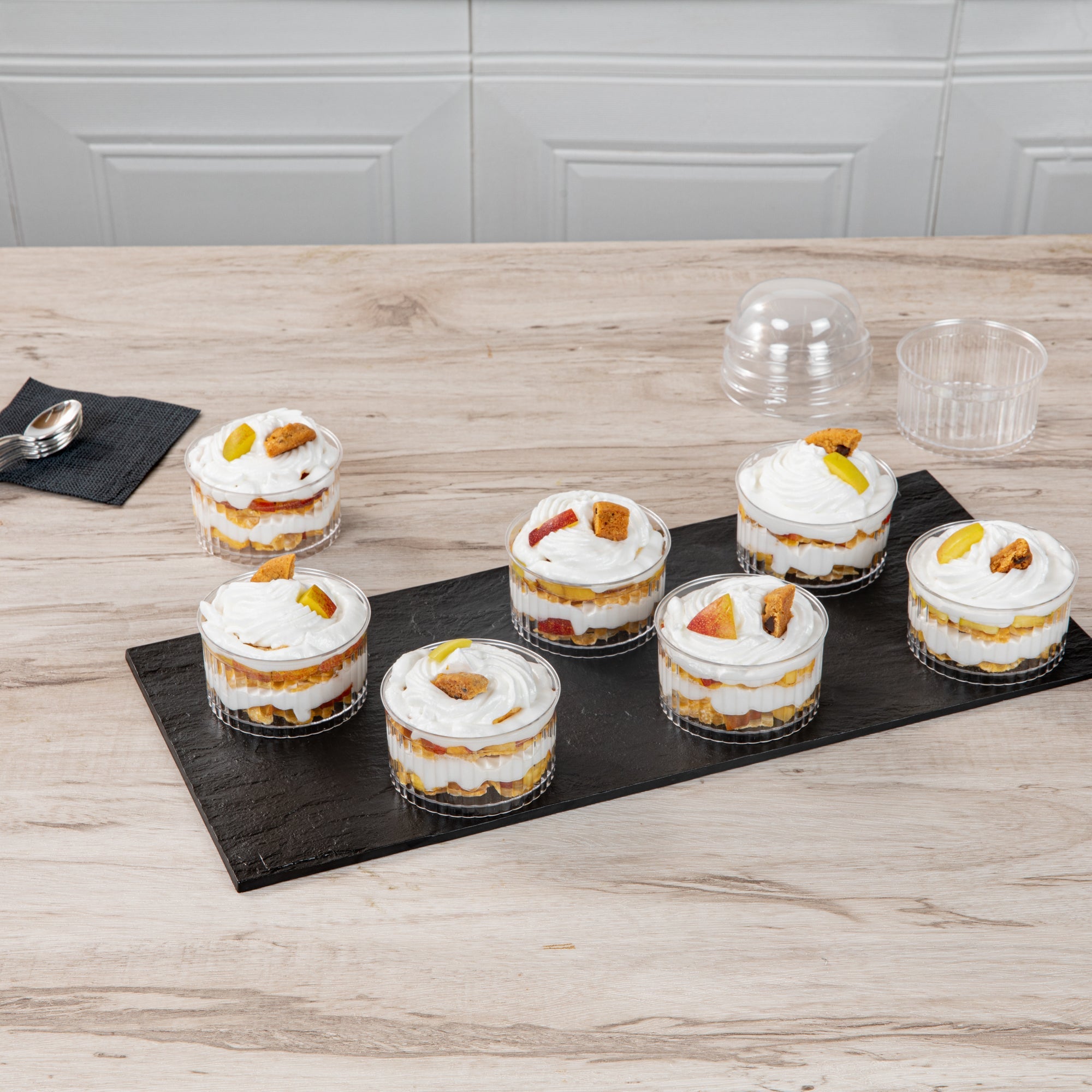 Mini Serve 4 oz Round Clear Plastic Dessert Cup - Fluted - 3'' x 3'' x 1 1/2'' - 25 count box