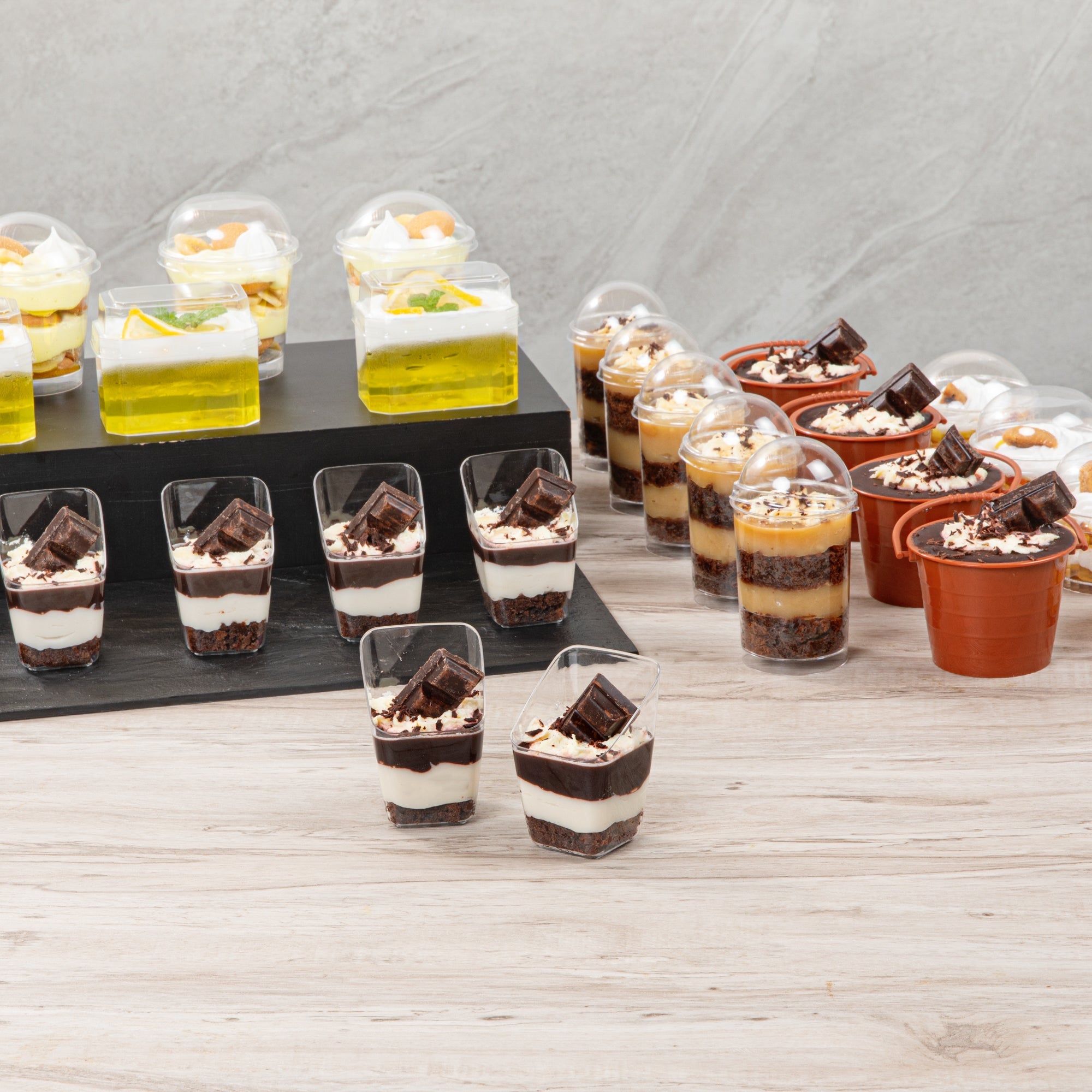 Mini Serve 2 oz Square Clear Plastic Dessert Cup Slanted - 2 1/4'' x 2 1/4'' x 3'' - 25 count box